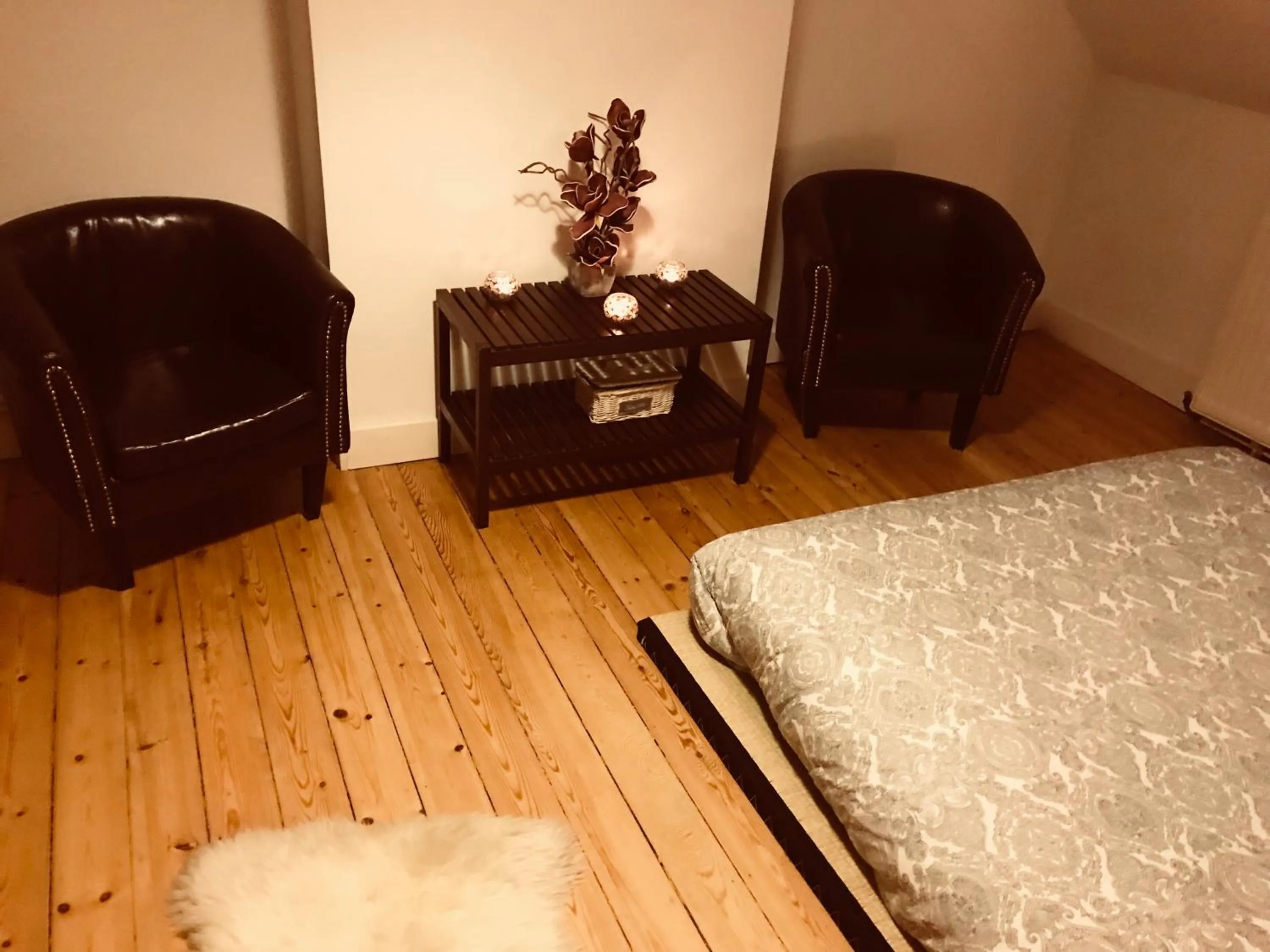 Seating area, Bed in Chic Cocoon Guest House