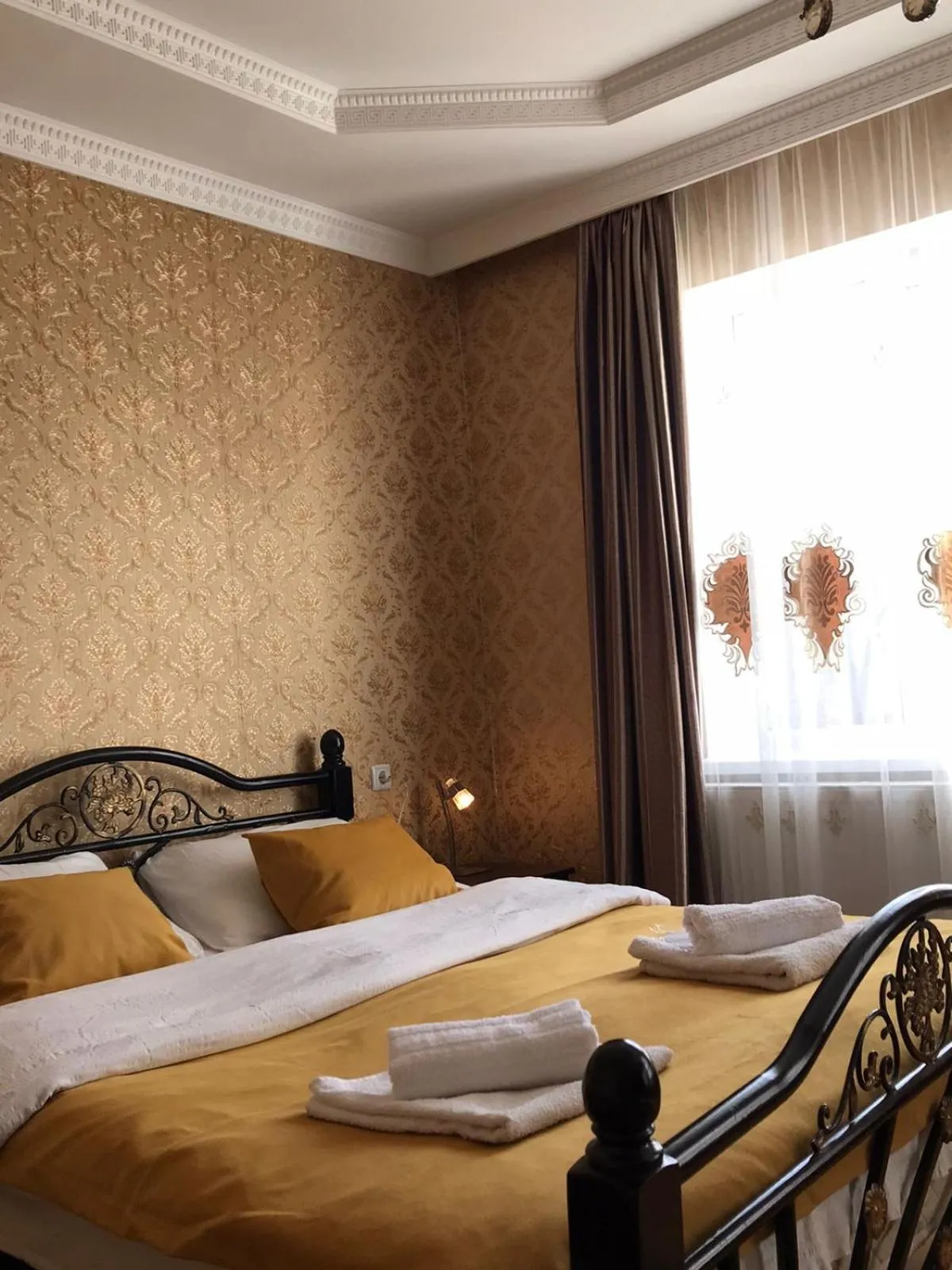 Bed in Guest House Elguja Qushashvili