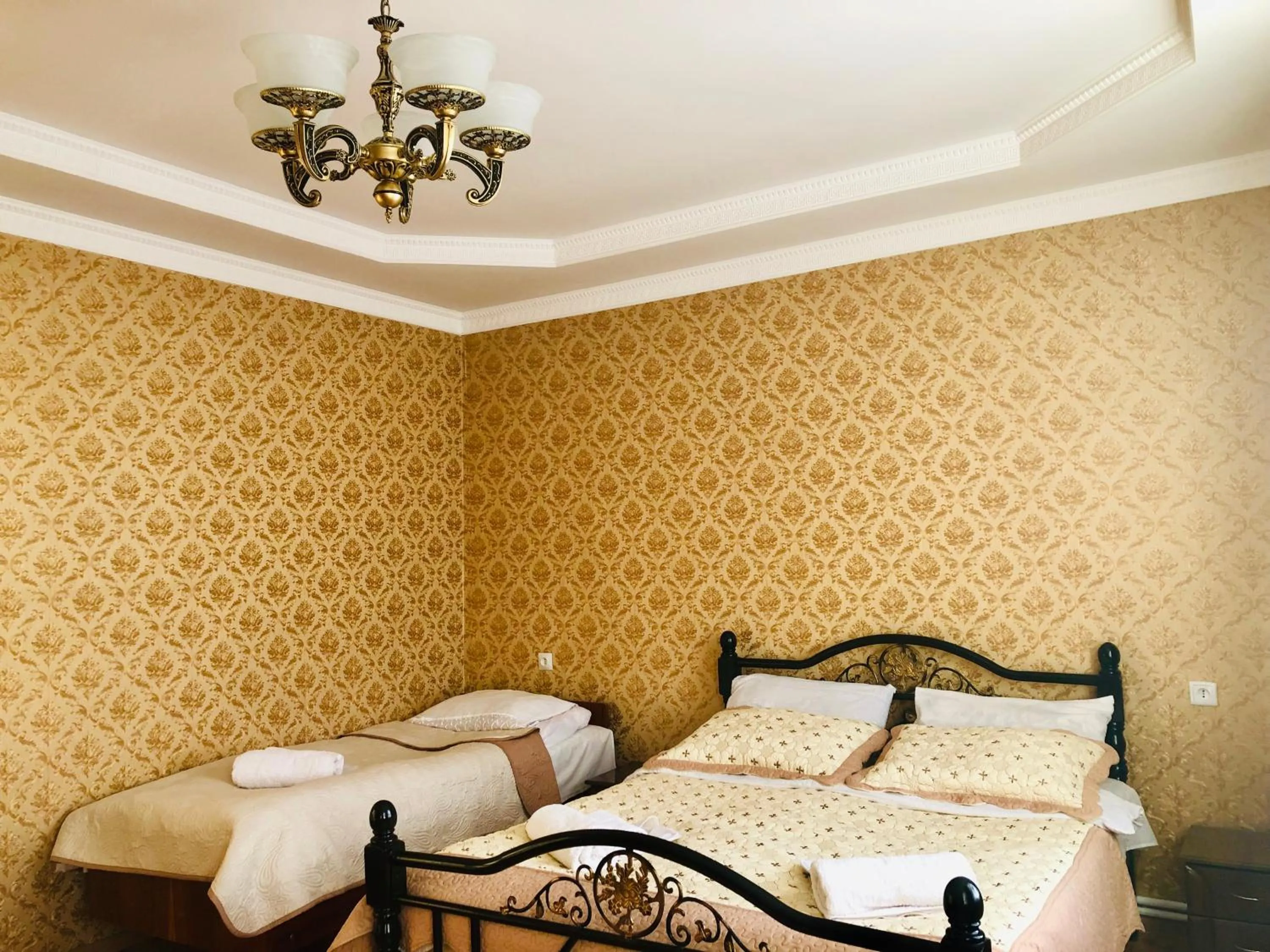 Bed in Guest House Elguja Qushashvili