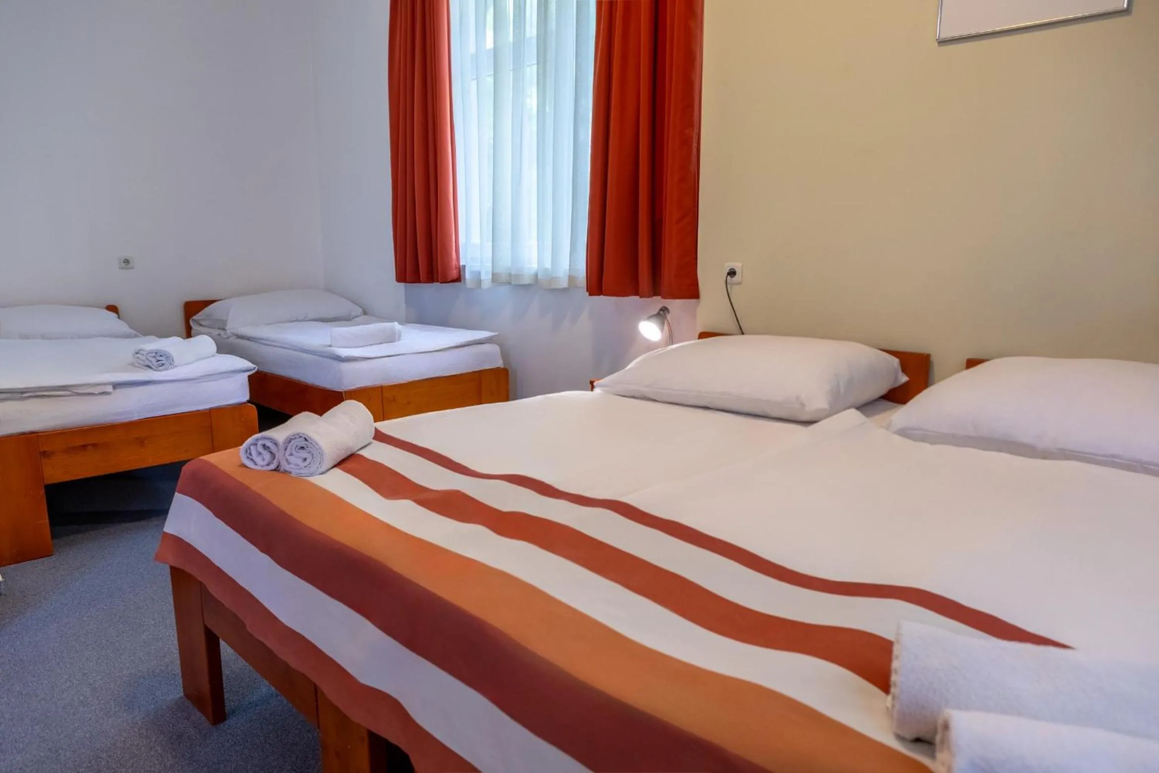 Bed in Fordan Hotel Pécs