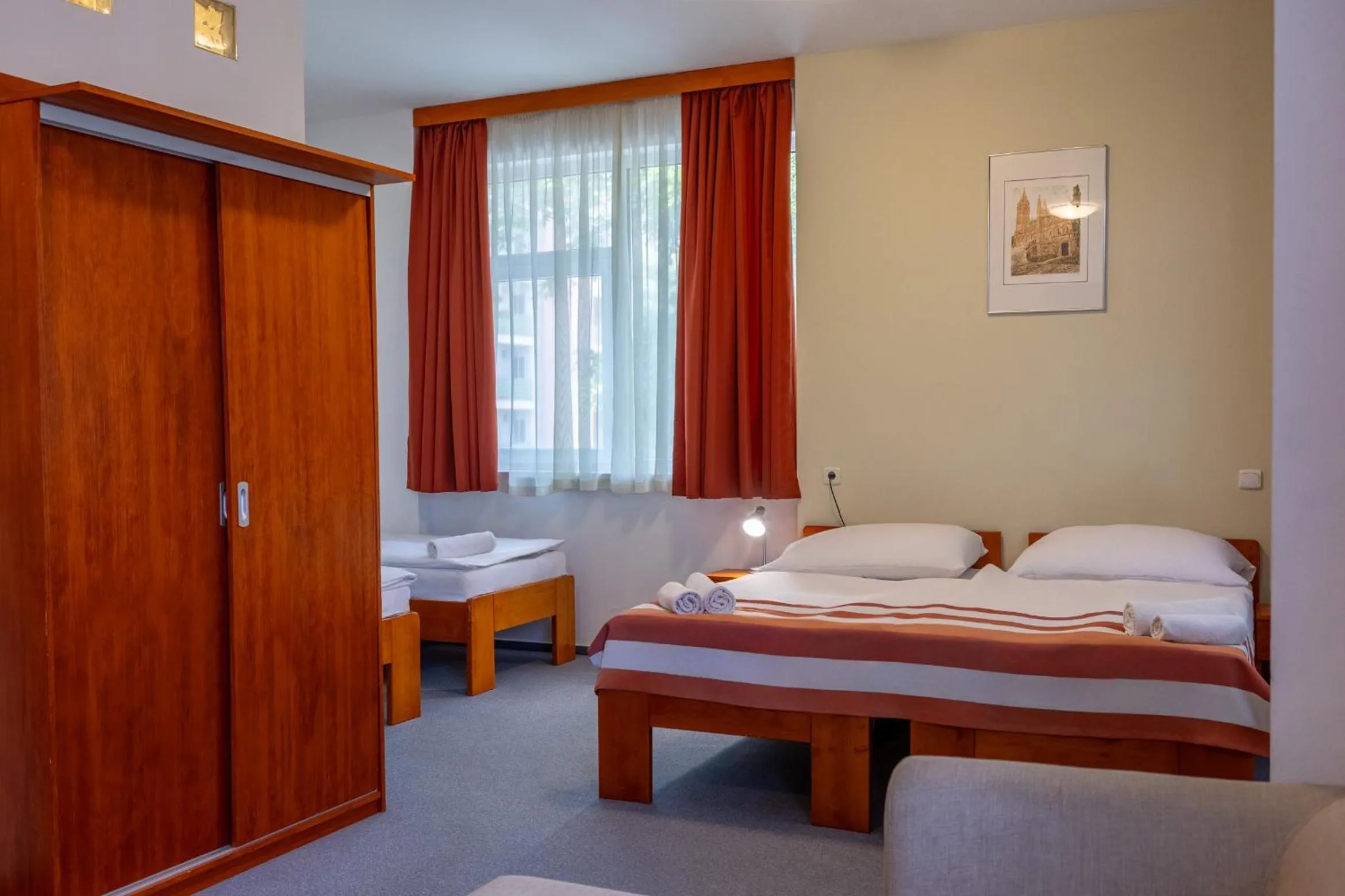 Bed in Fordan Hotel Pécs