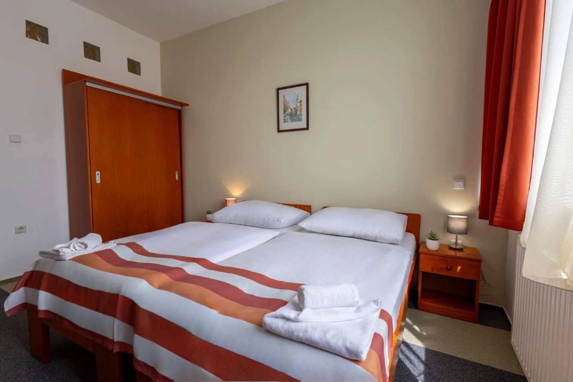 Bed in Fordan Hotel Pécs