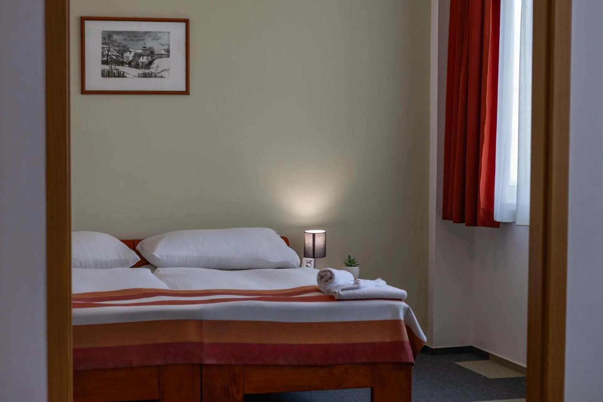 Bed in Fordan Hotel Pécs