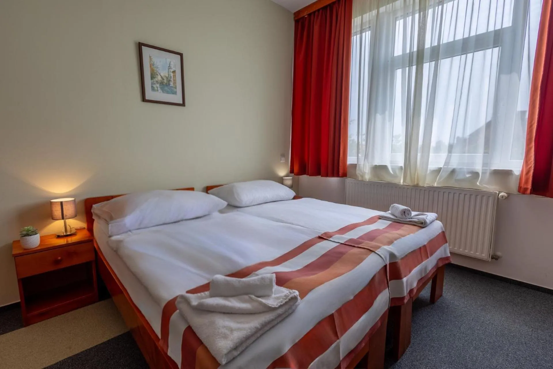 Bed in Fordan Hotel Pécs