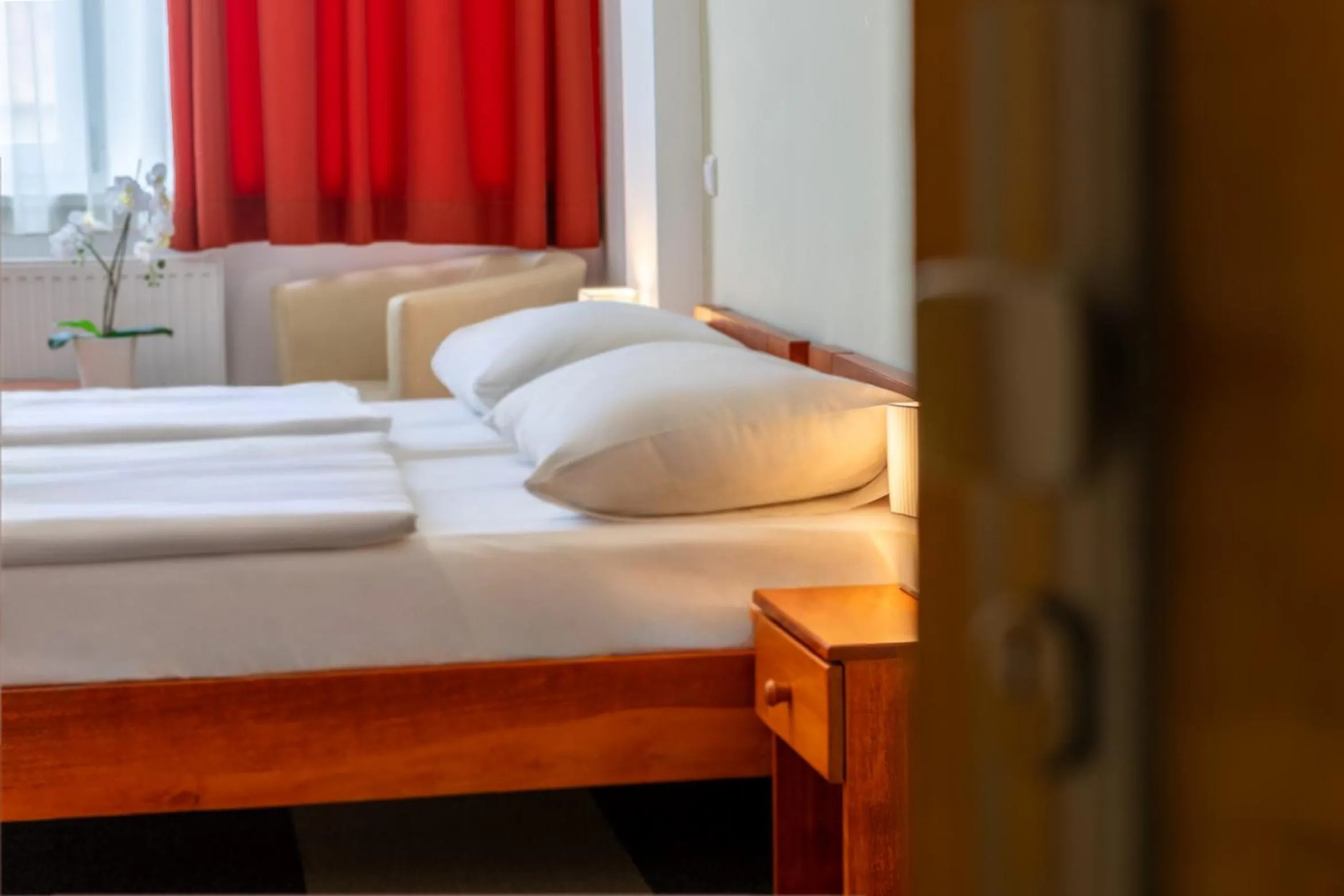 Bed in Fordan Hotel Pécs
