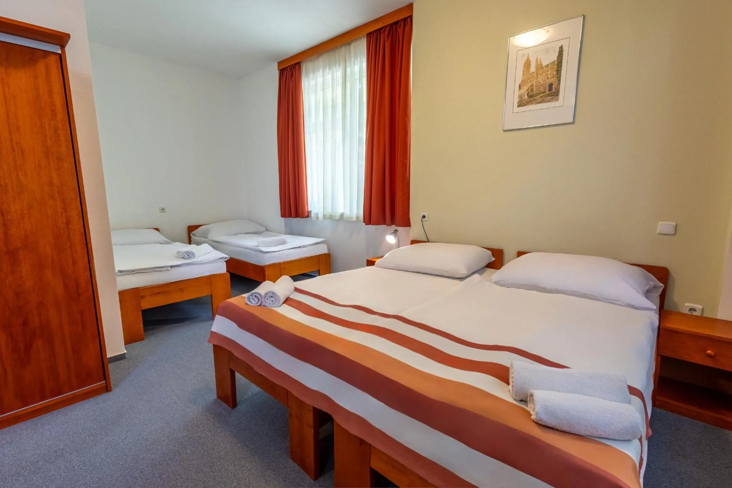 Bed in Fordan Hotel Pécs