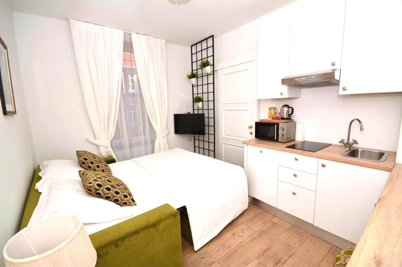 Bed in Manduša Heritage Apartments