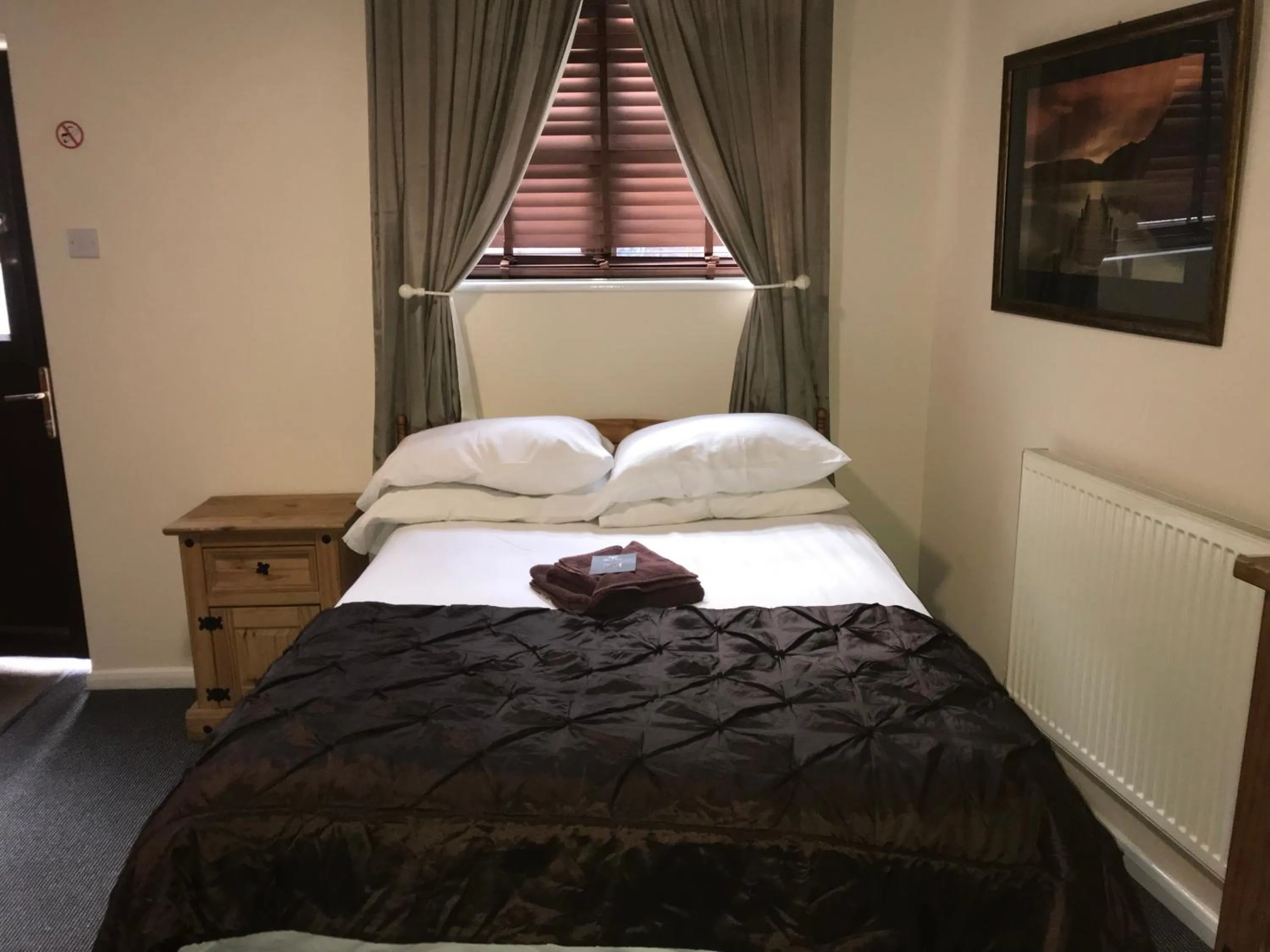 Bed in The Coach House at The Bull Inn