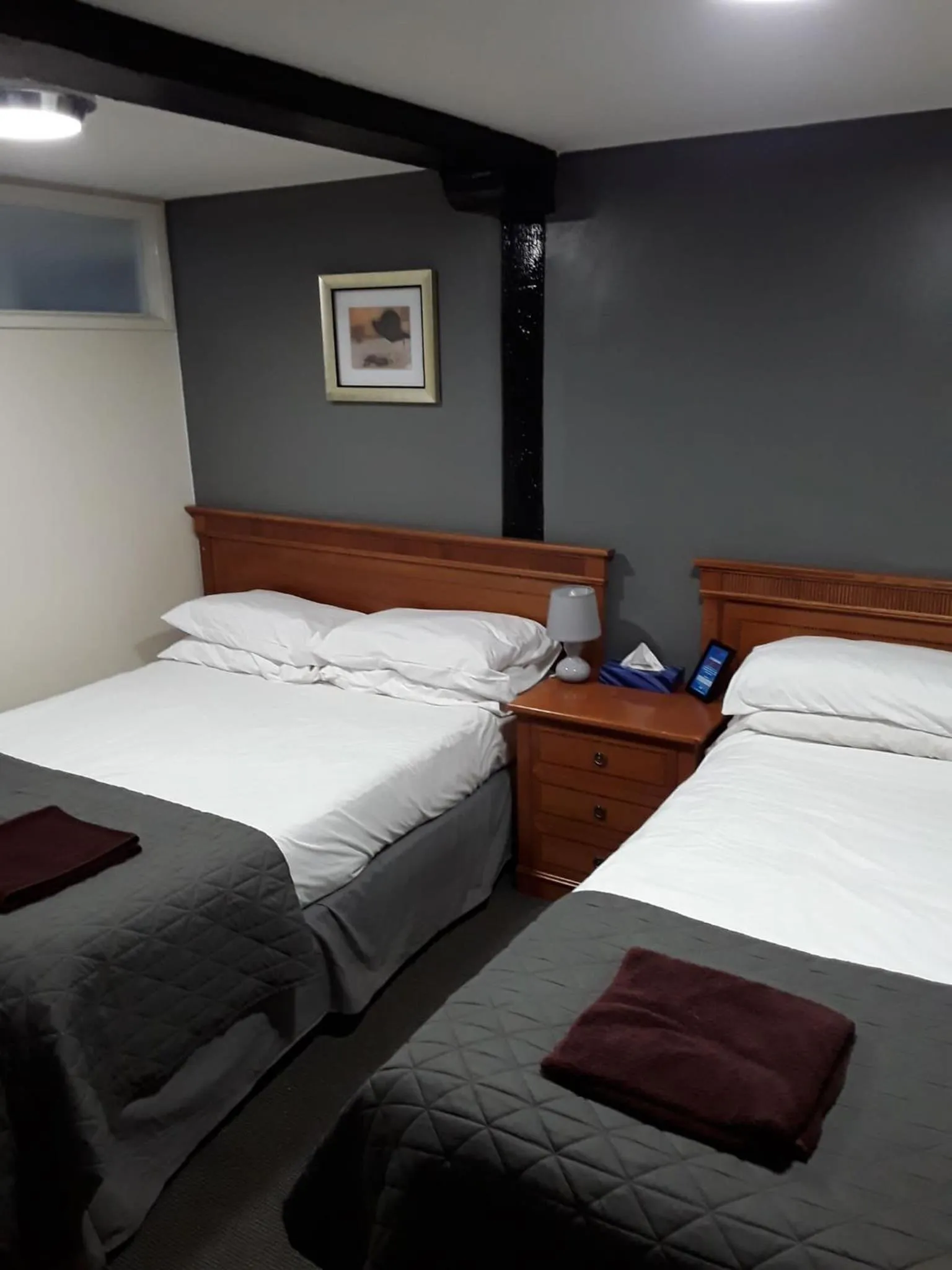 Bed in The Coach House at The Bull Inn