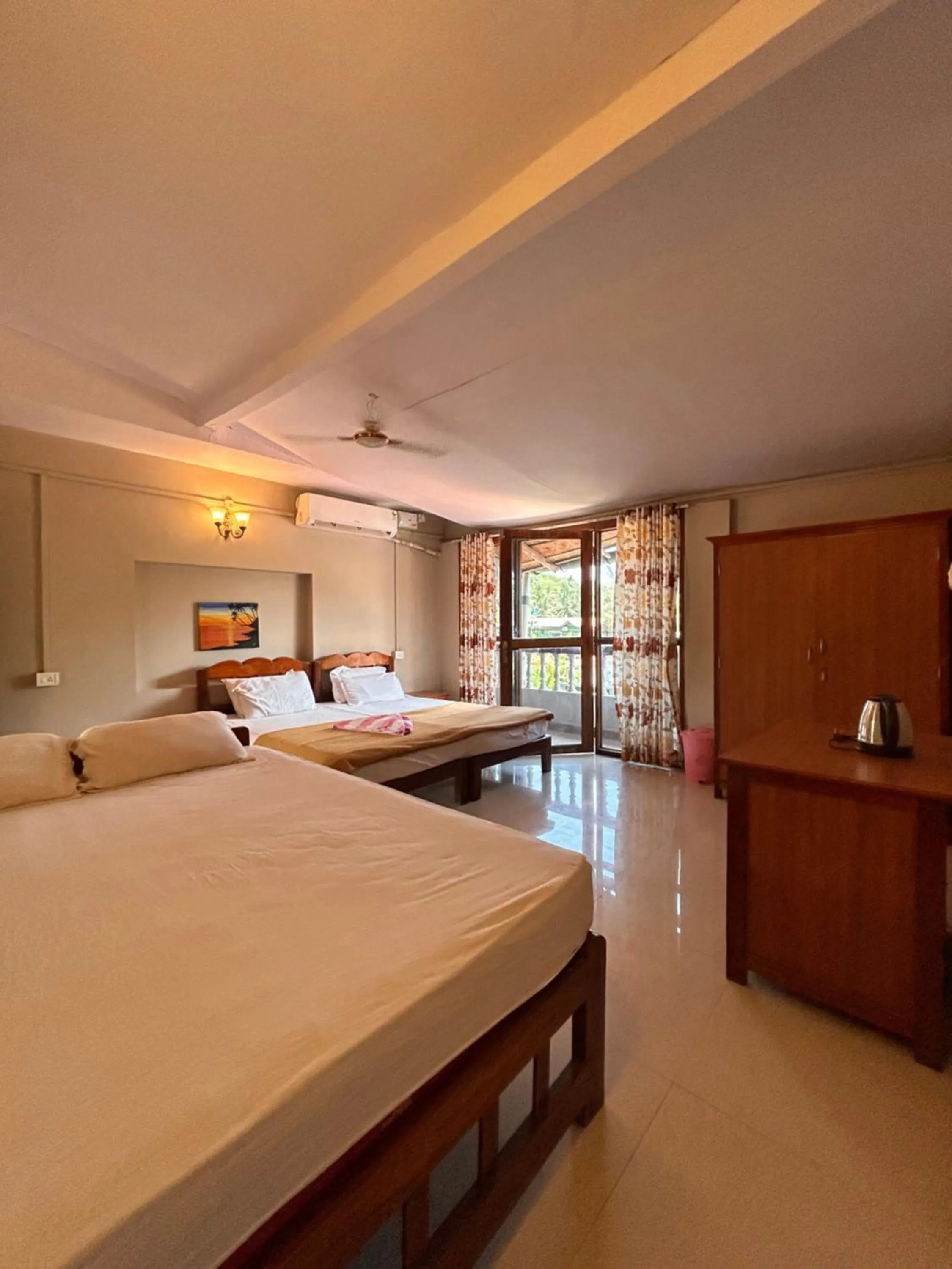 Bed in Maria Paulo Guest House Bar and Restaurant