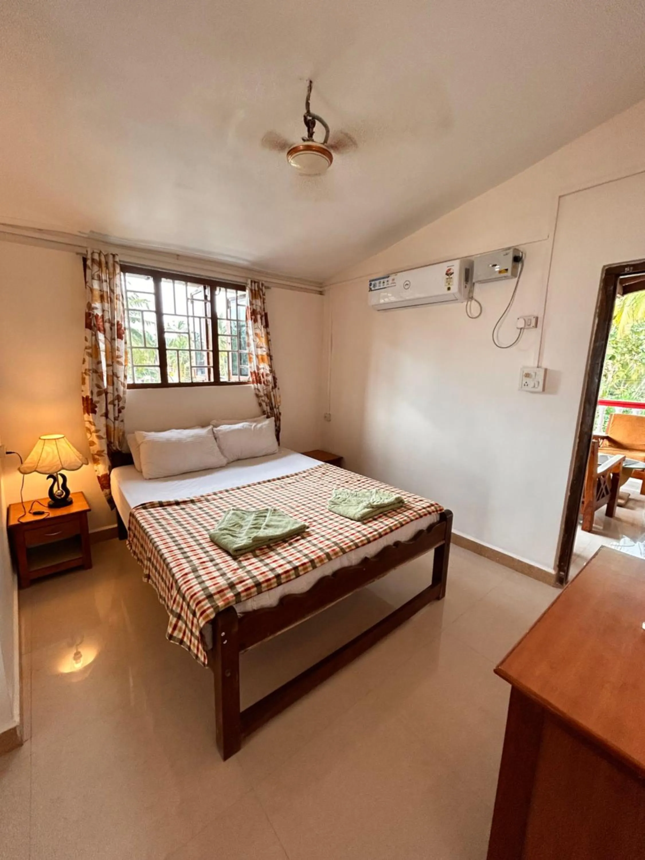 Bed in Maria Paulo Guest House Bar and Restaurant