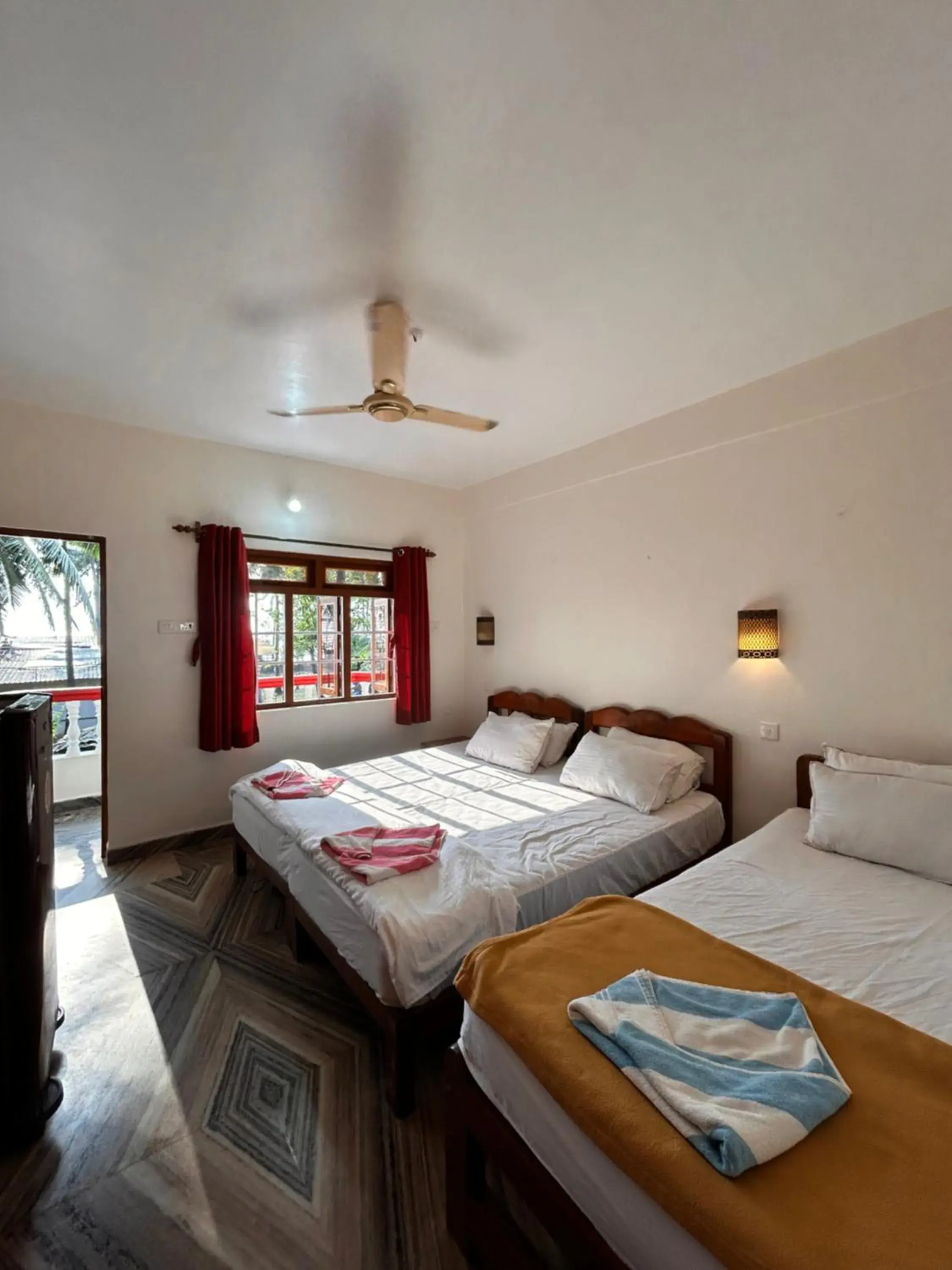 Triple Room with Balcony in Maria Paulo Guest House Bar and Restaurant Triple Room with Balcony in Maria Paulo Guest House Bar and Restaurant