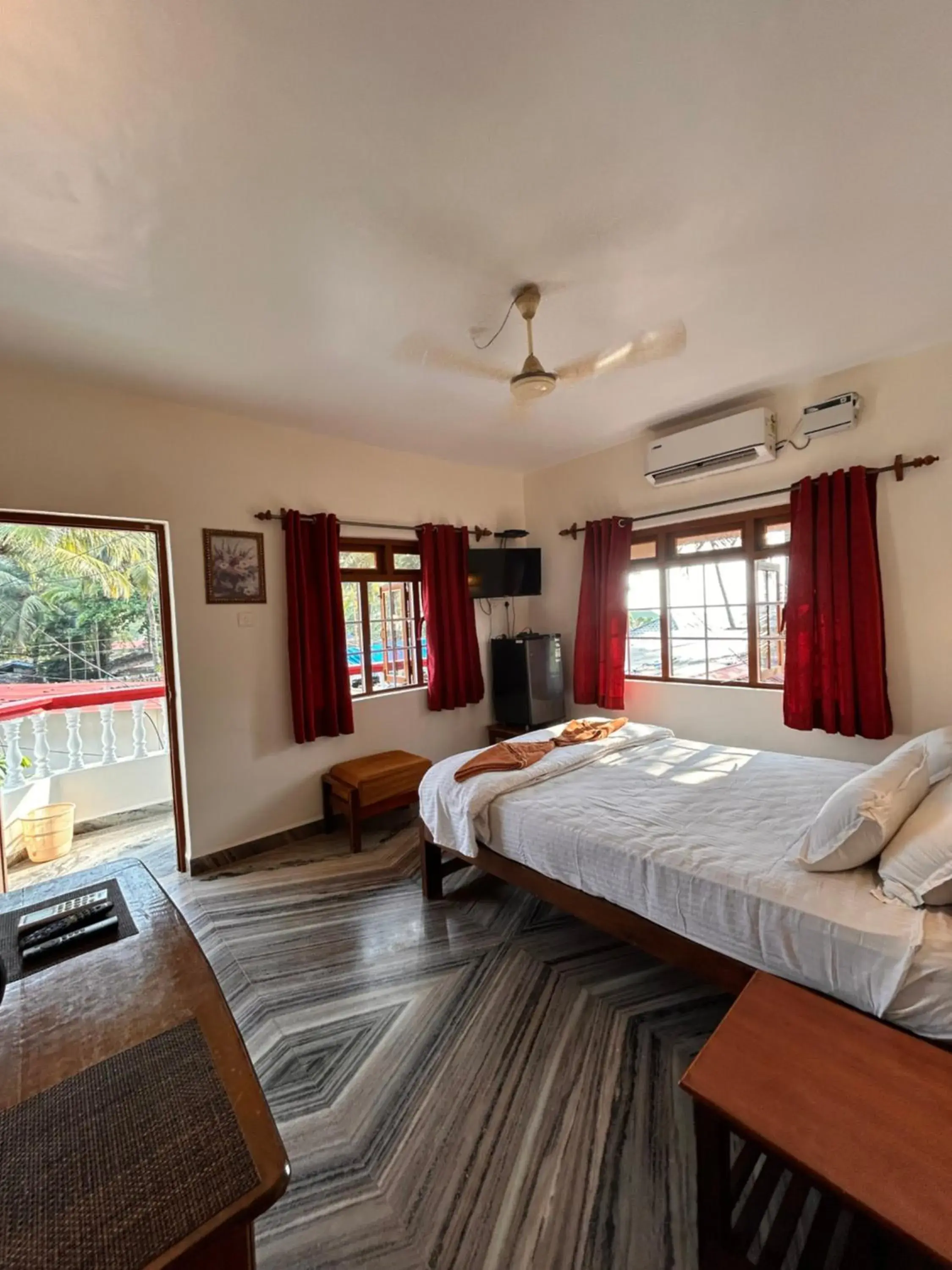 King Room with Balcony in Maria Paulo Guest House Bar and Restaurant King Room with Balcony in Maria Paulo Guest House Bar and Restaurant