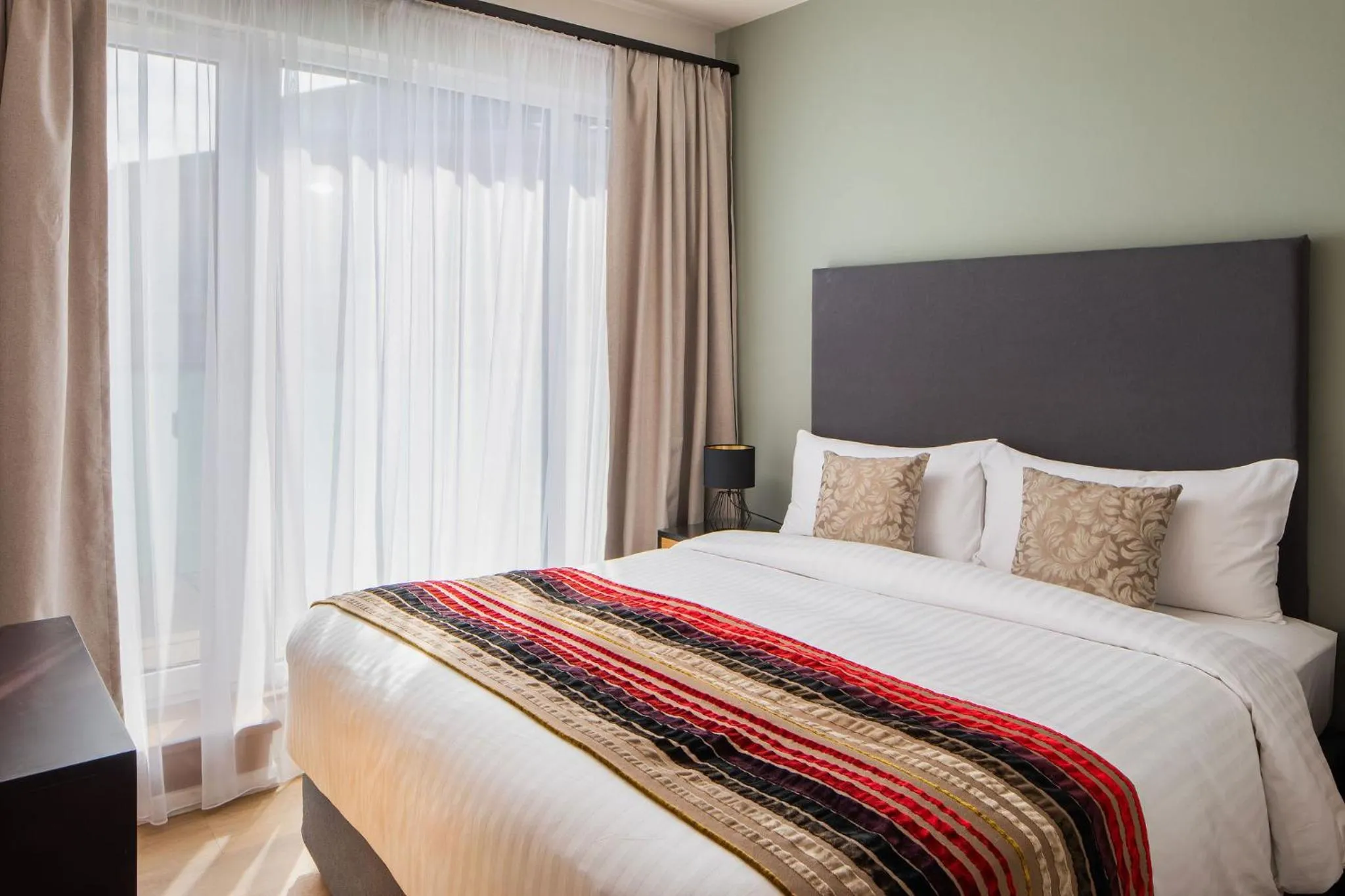 Bed in Escala Hotel & Suites