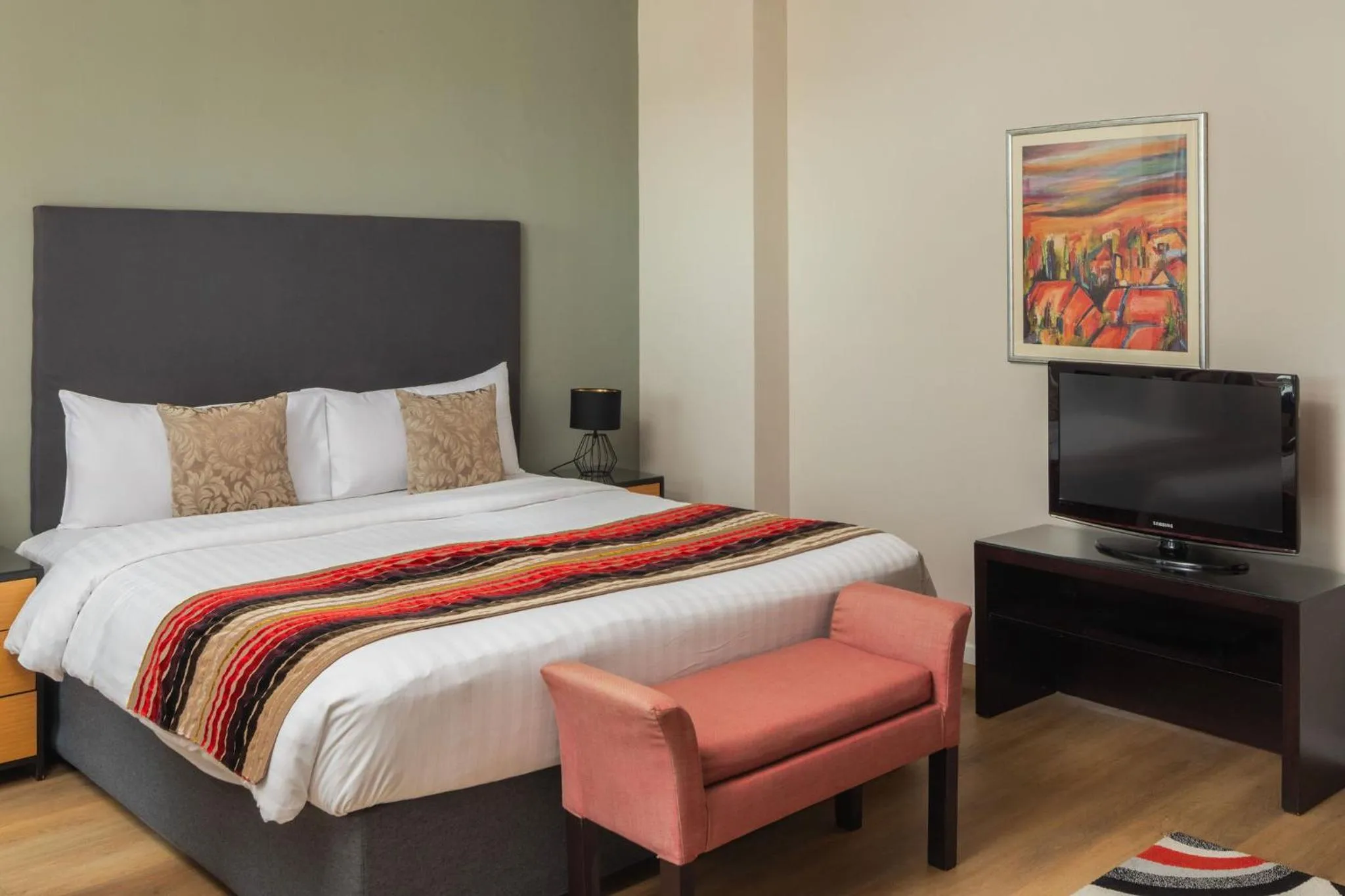 Bed in Escala Hotel & Suites