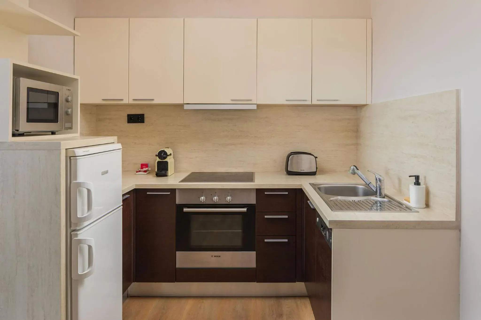 kitchen in Escala Hotel & Suites kitchen in Escala Hotel & Suites