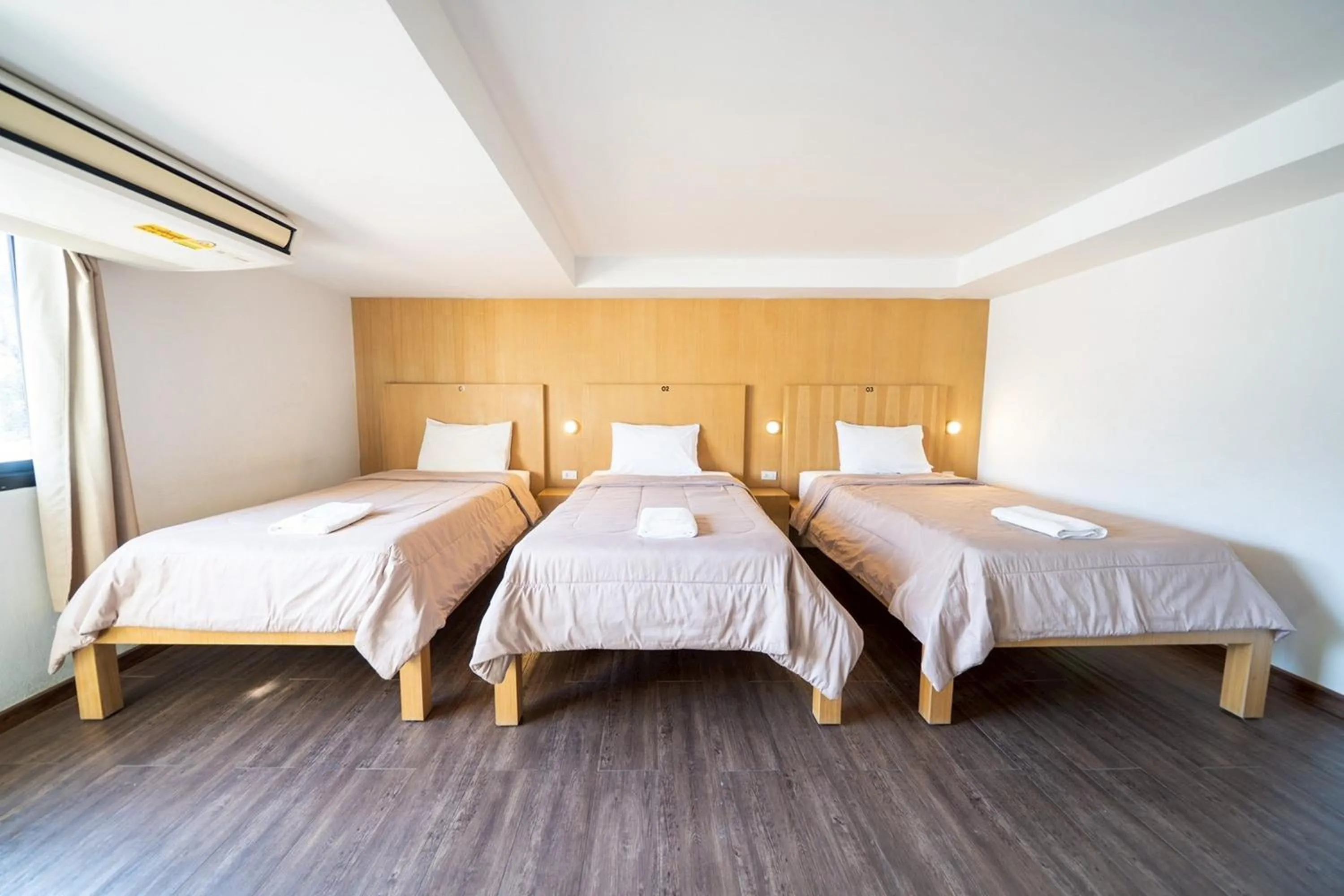 Bed in Koenji Guest House & Bar Chiang Mai