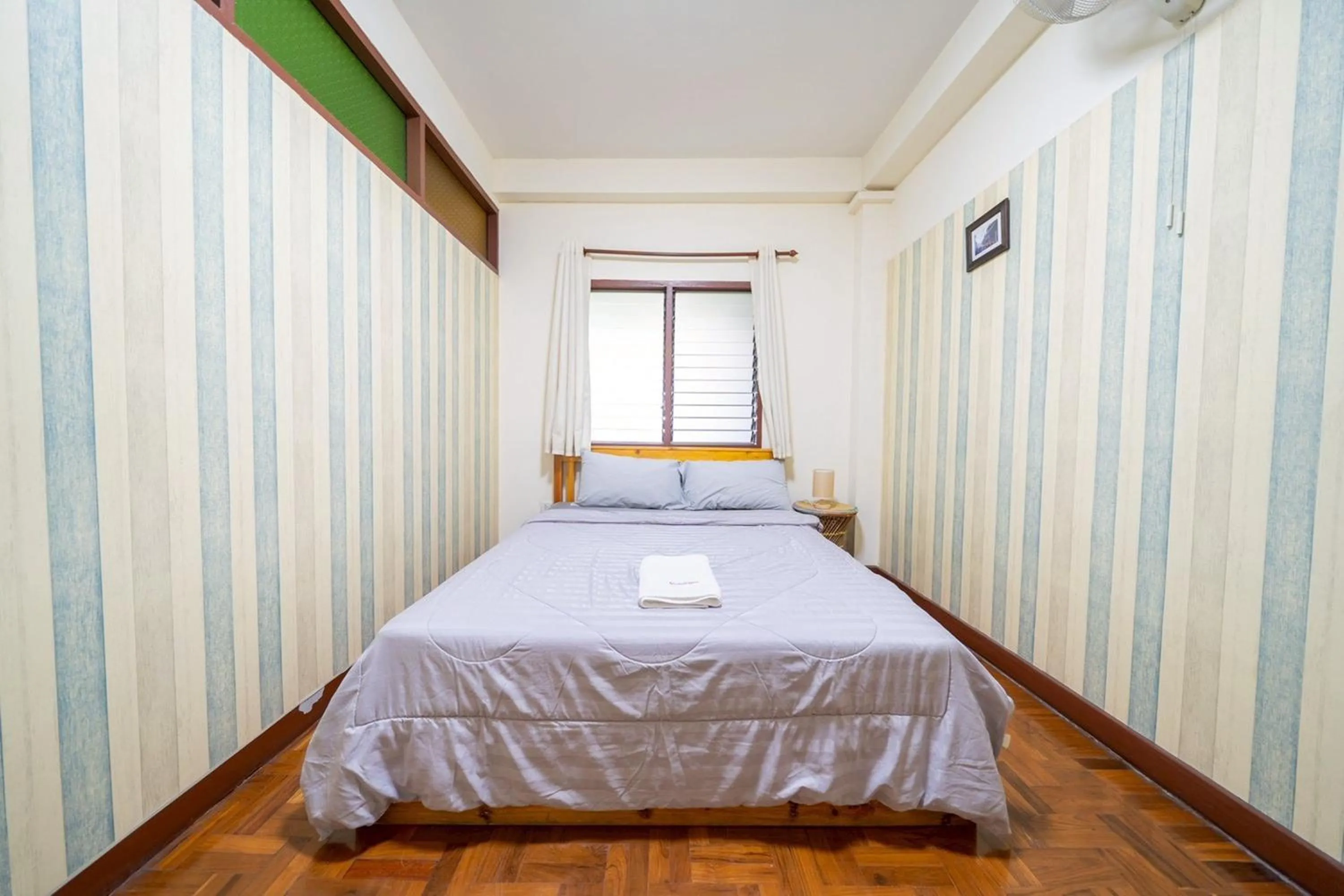 Bed in Koenji Guest House & Bar Chiang Mai