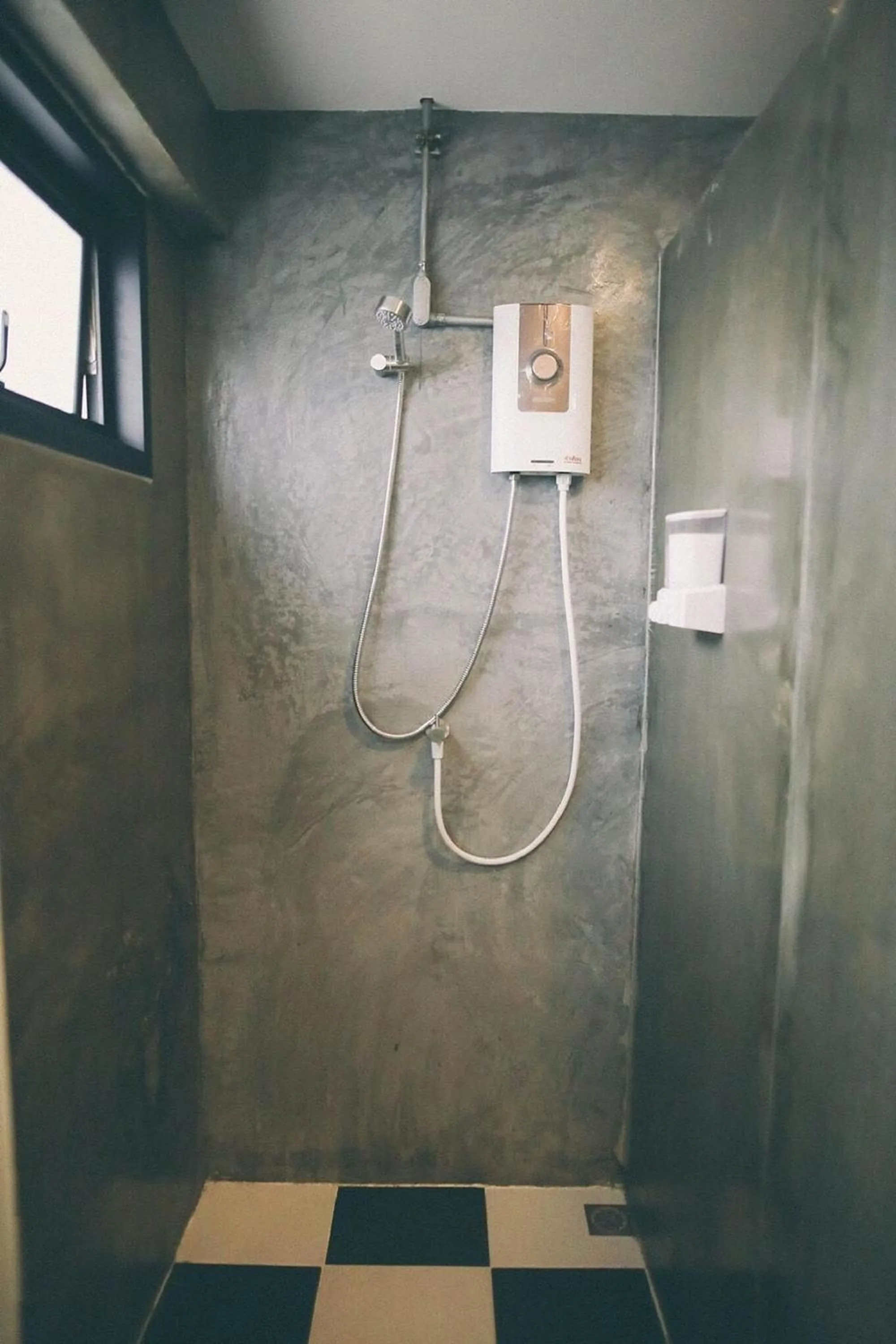 Bathroom in Koenji Guest House & Bar Chiang Mai