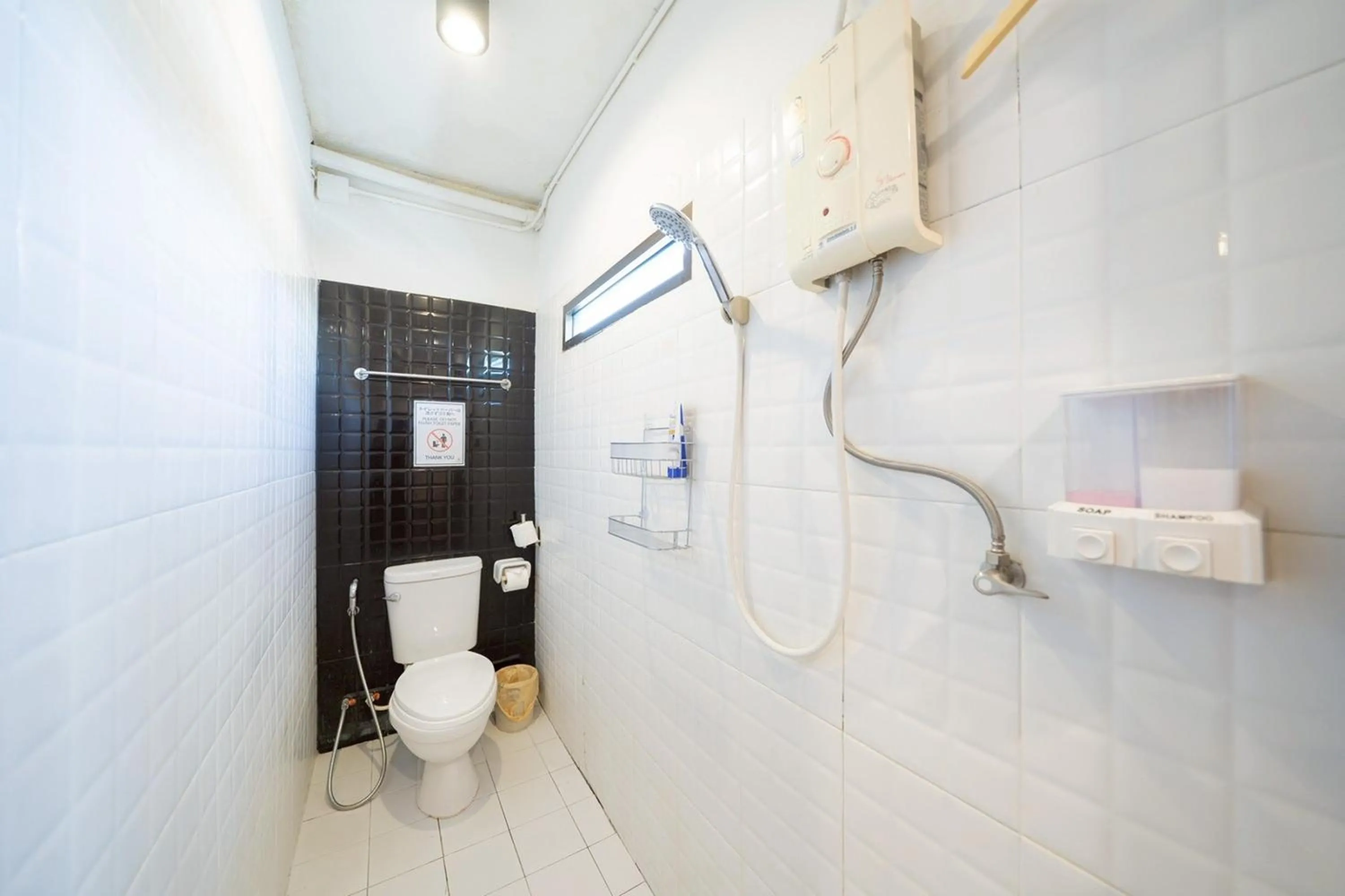 Bathroom in Koenji Guest House & Bar Chiang Mai