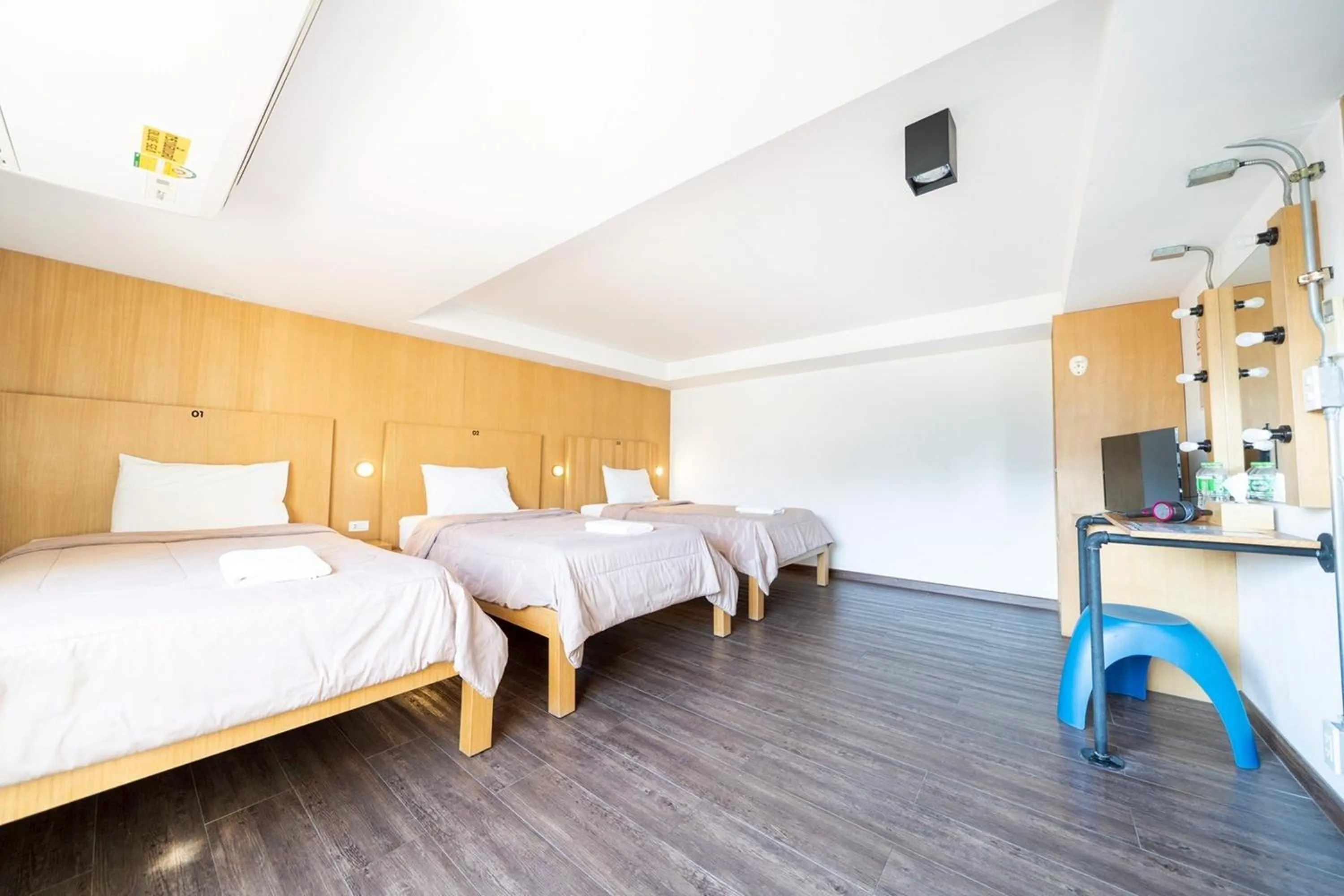 Bed in Koenji Guest House & Bar Chiang Mai