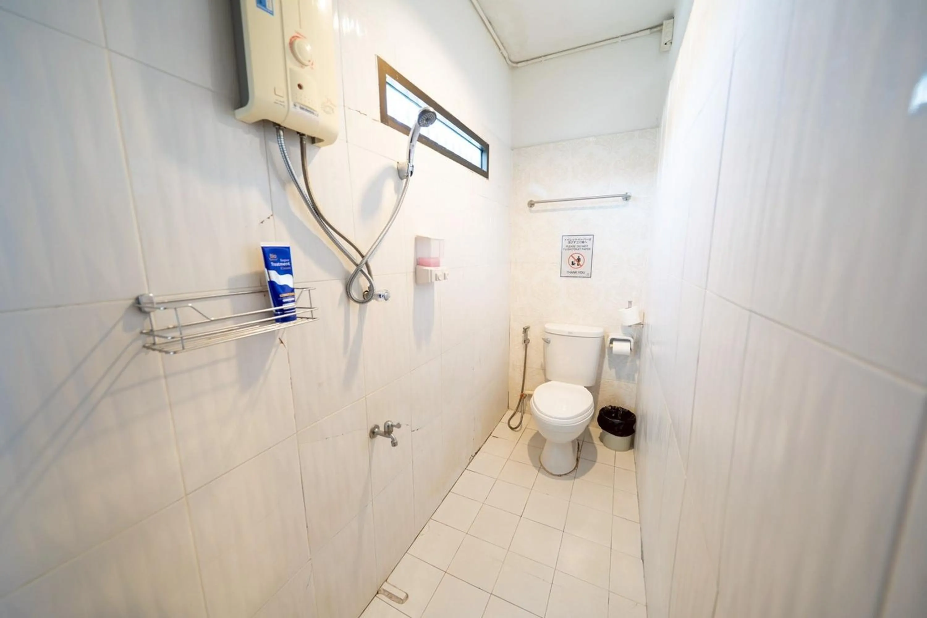 Bathroom in Koenji Guest House & Bar Chiang Mai