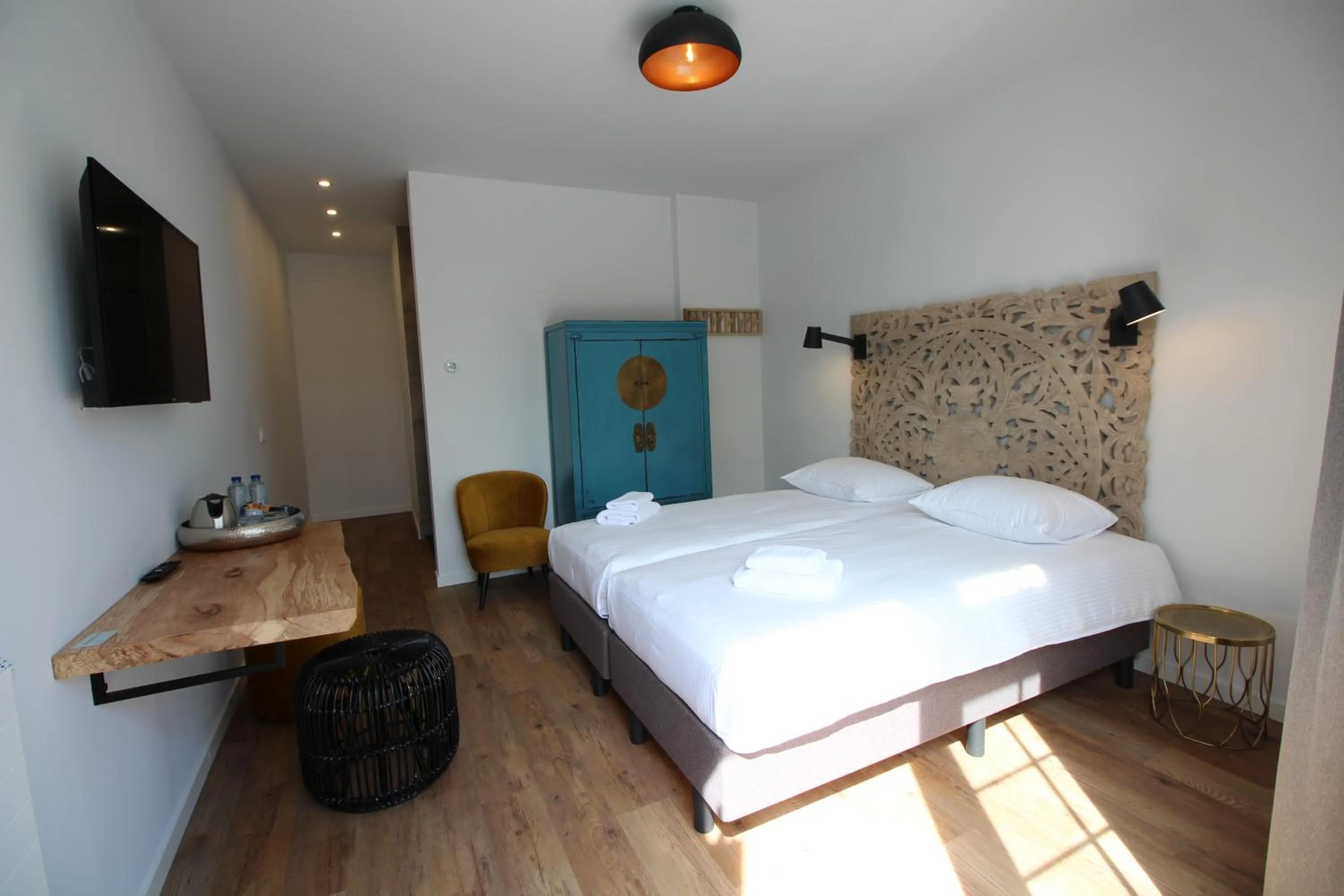 Bed in Strandhotel Dennenbos