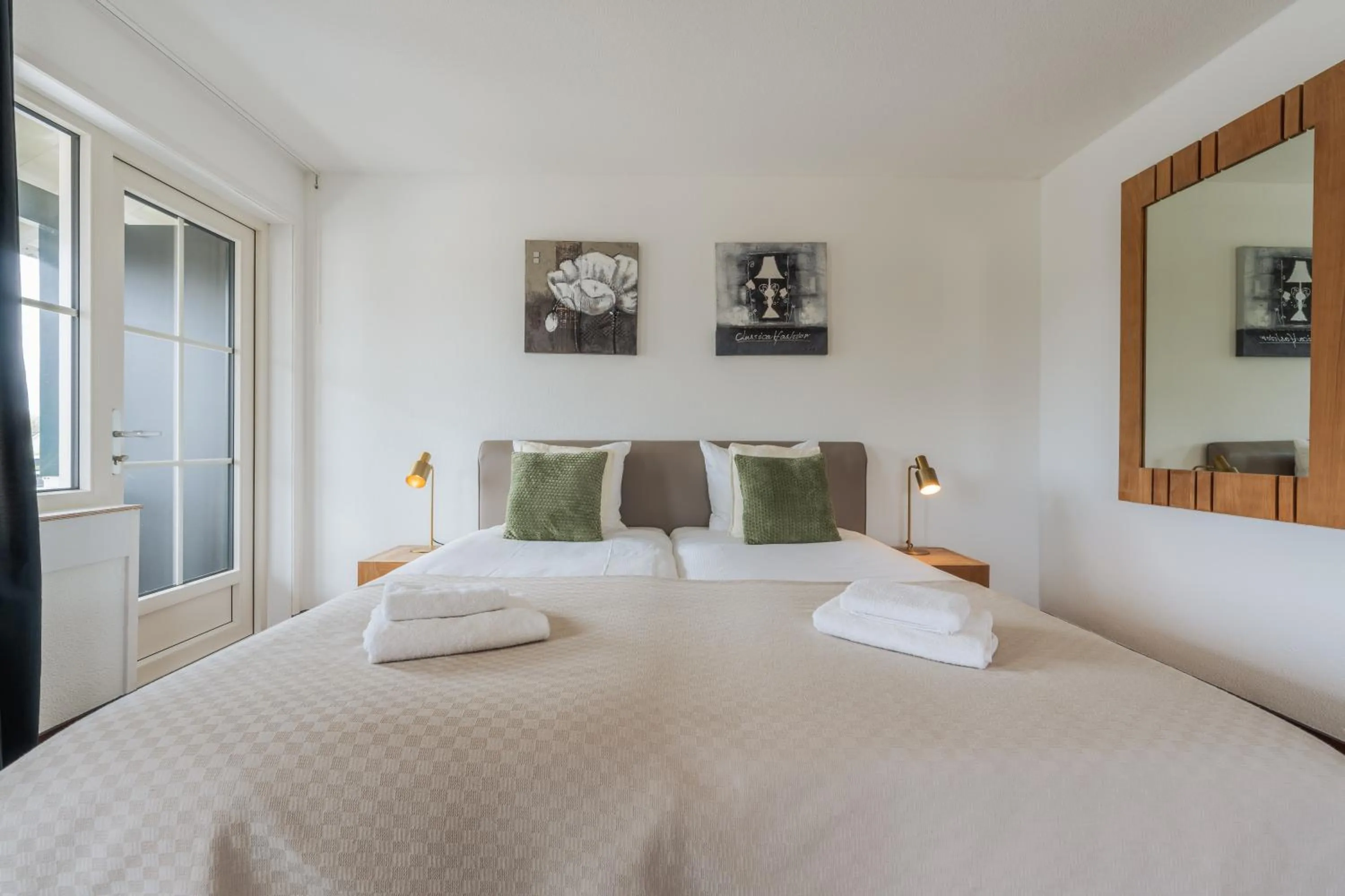 Bed in Strandhotel Dennenbos