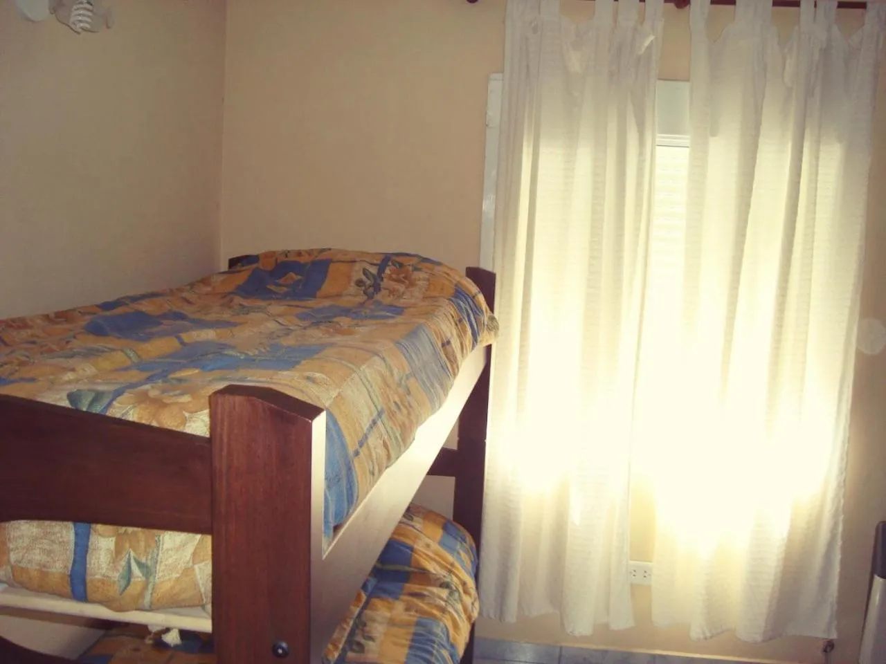 Bed in Departamentos Las Grutas Enjoy