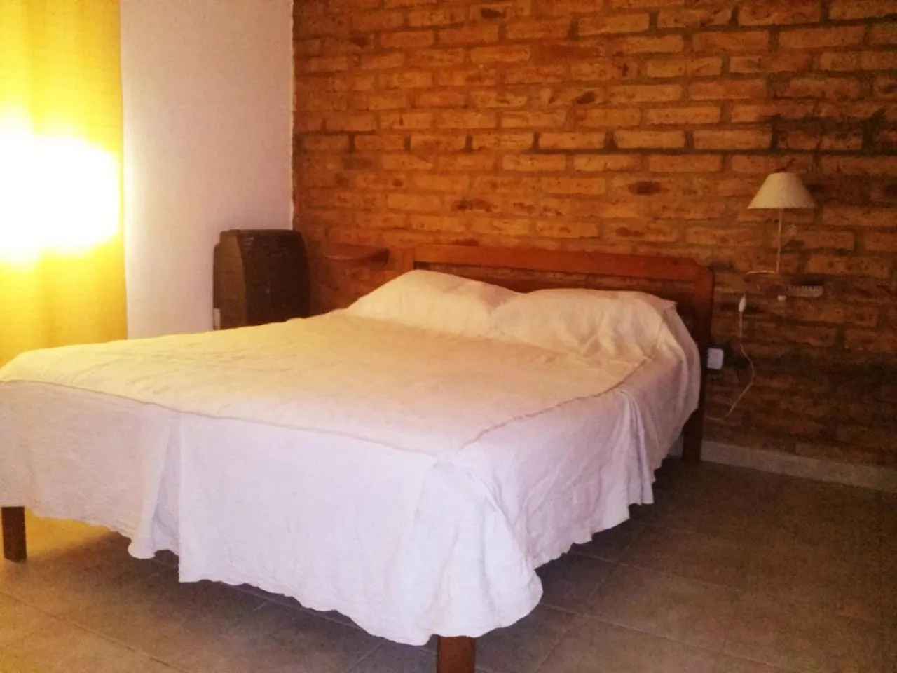 Bed in Departamentos Las Grutas Enjoy