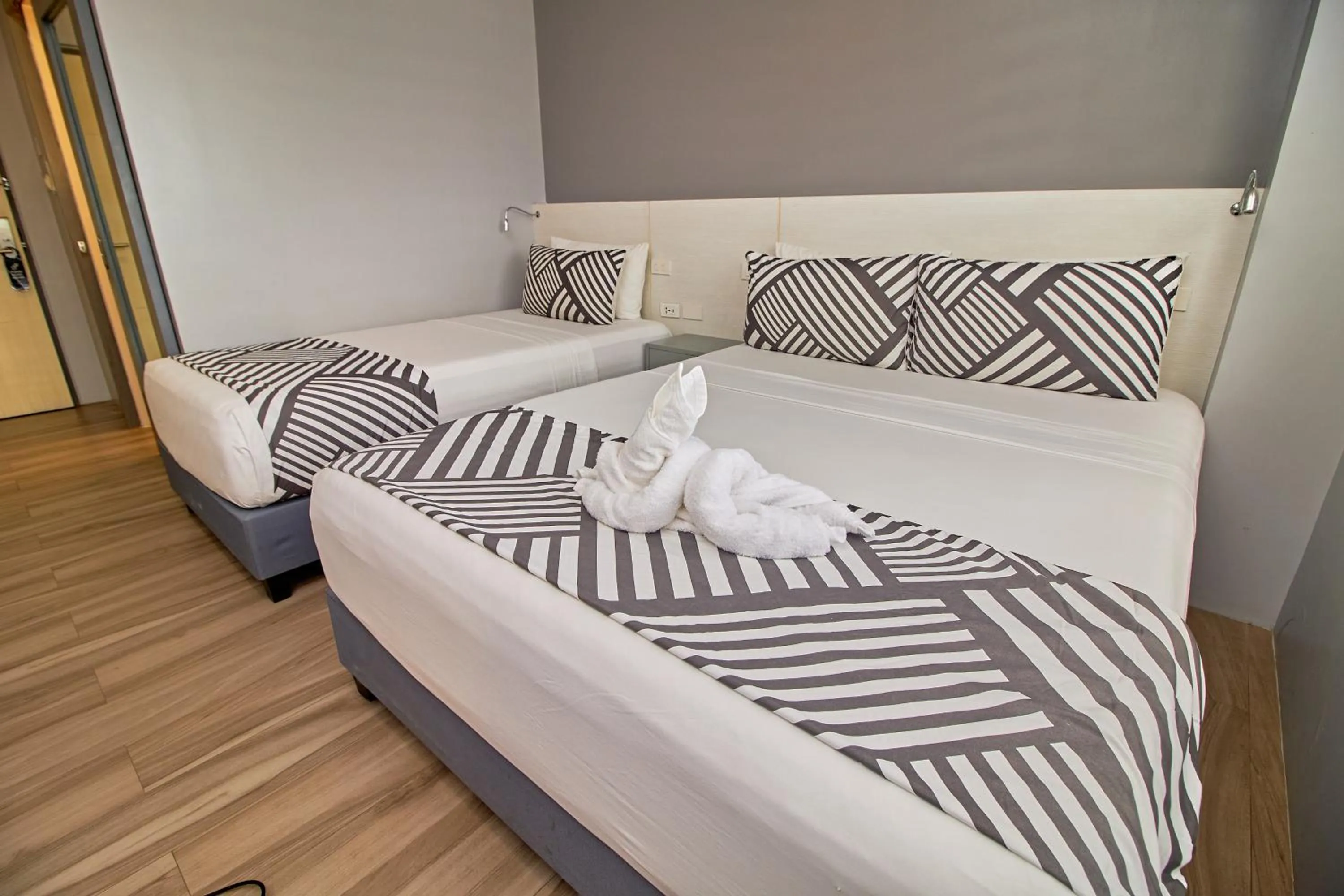 Bed in Cebu Hotel Plus