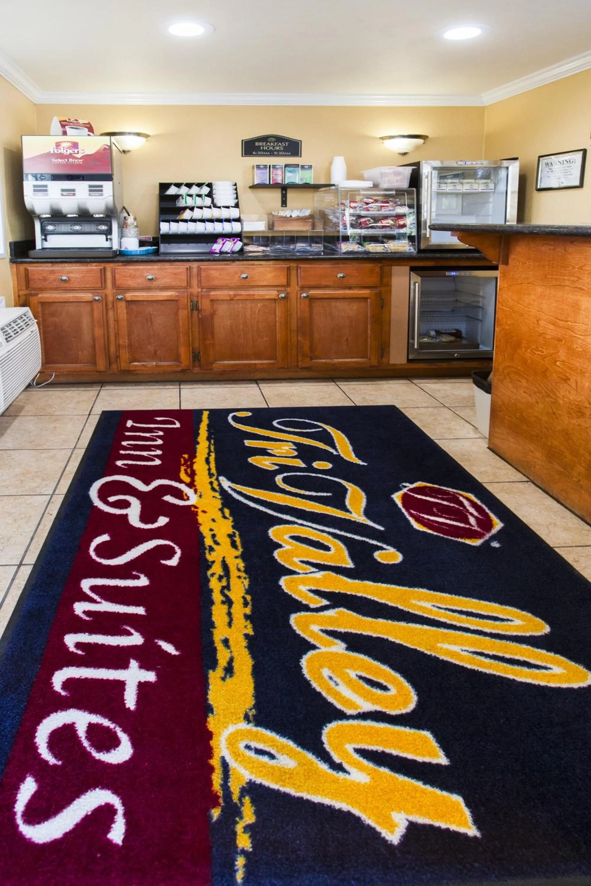 Property logo or sign in Tri-Valley Inn & Suites