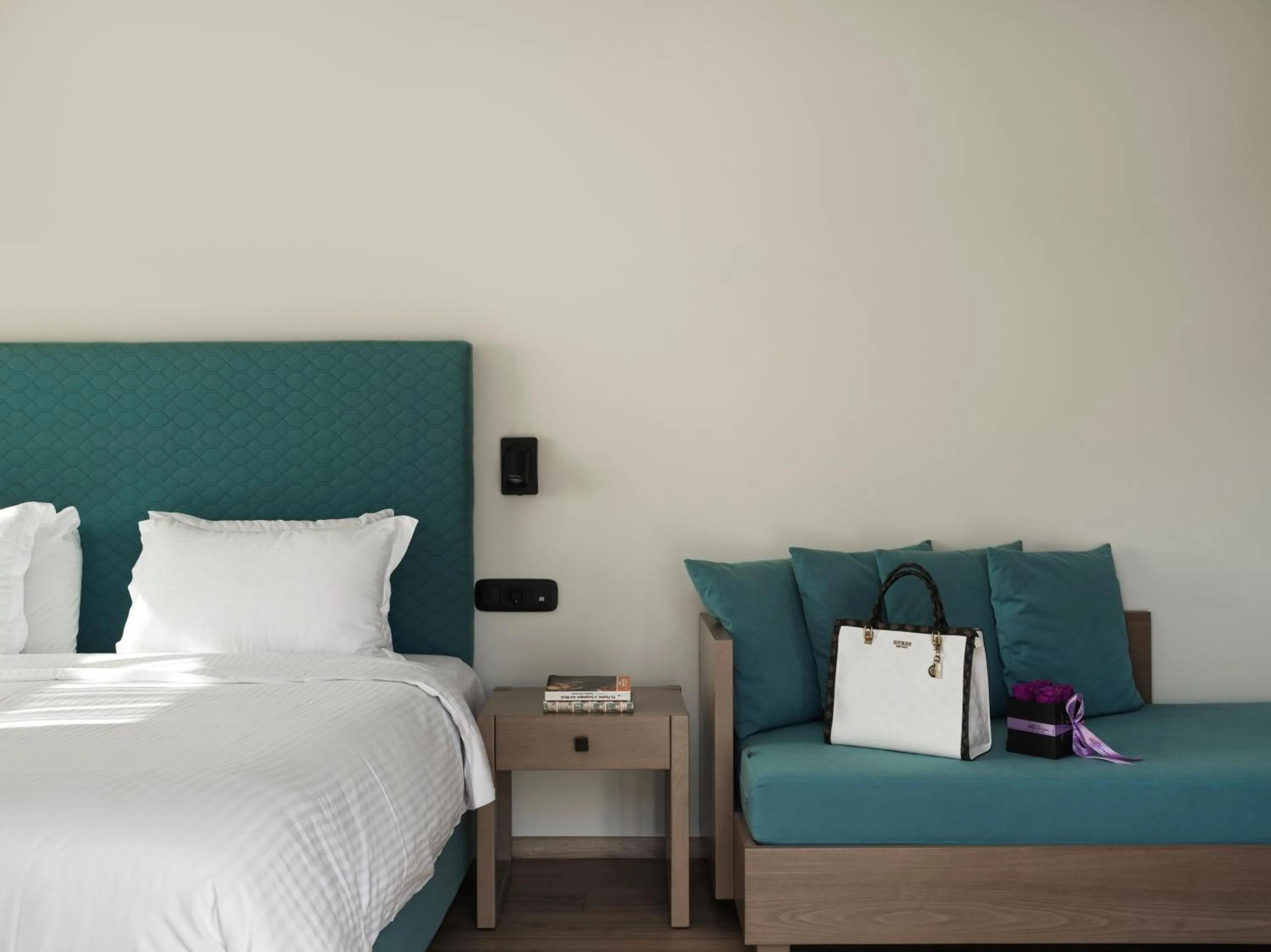 Bed in Civitel Attik Rooms & Suites