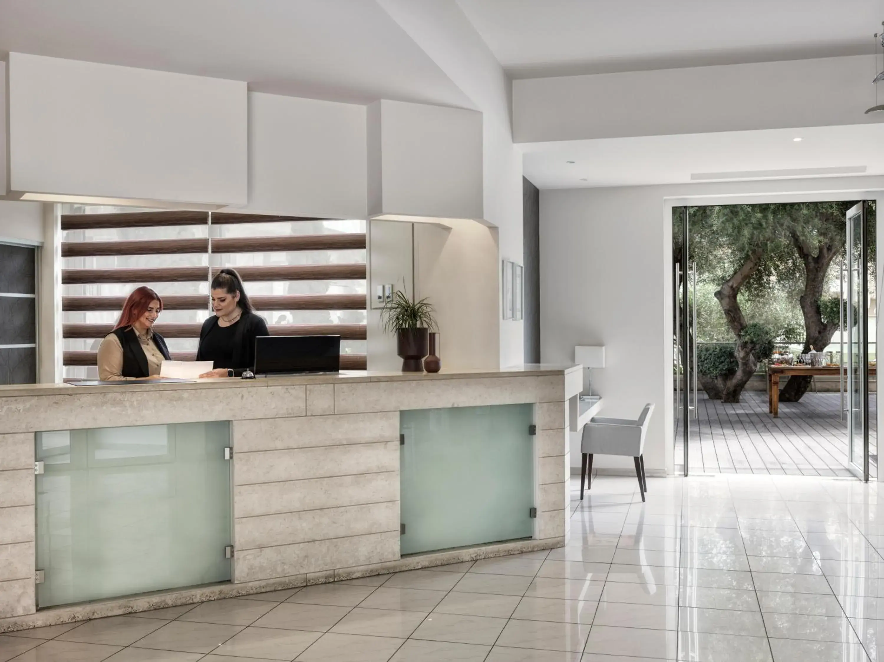 Lobby or reception in Civitel Attik Rooms & Suites Lobby or reception in Civitel Attik Rooms & Suites