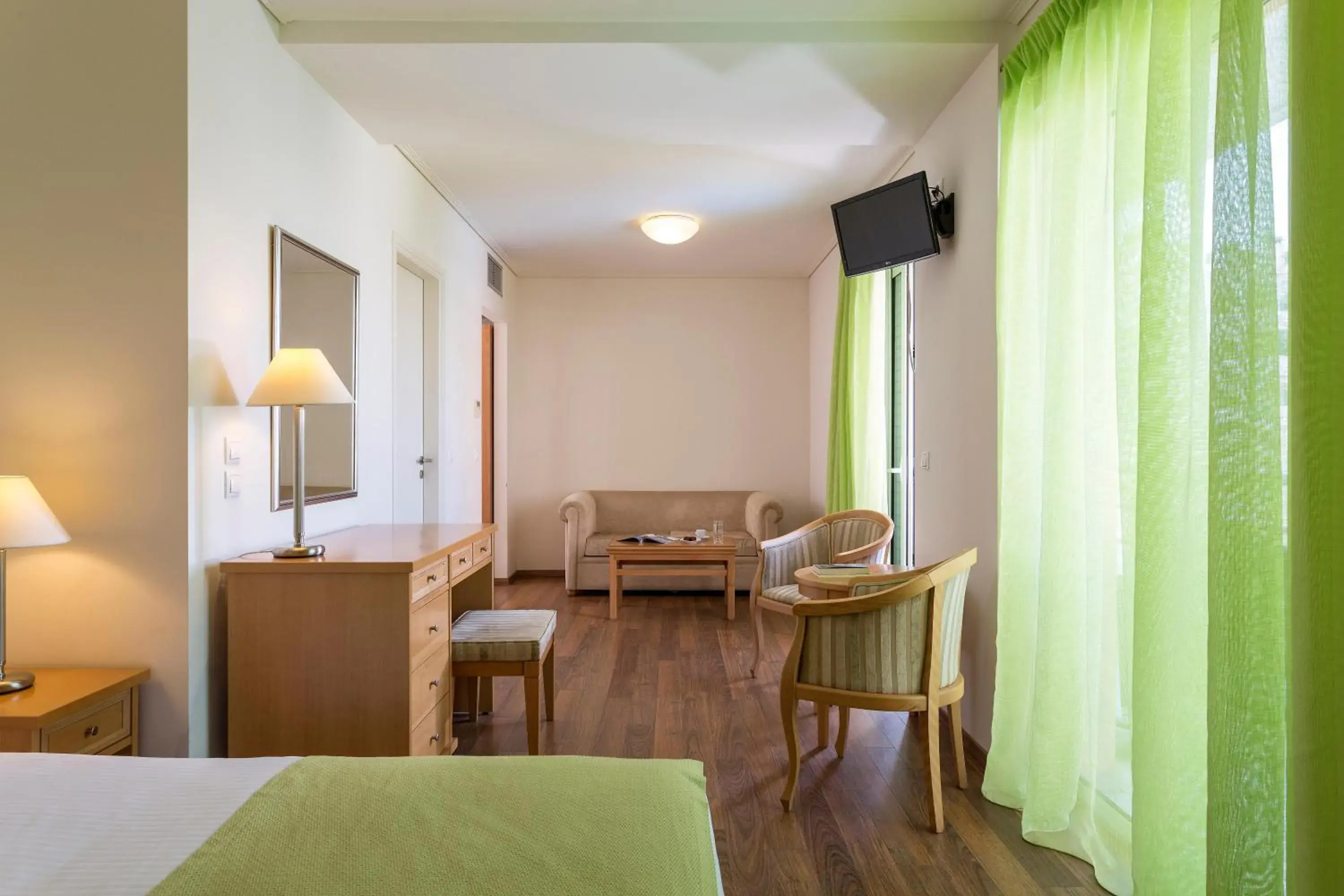 Photo of the whole room, Bed in Civitel Attik Rooms & Suites Photo of the whole room, Bed in Civitel Attik Rooms & Suites