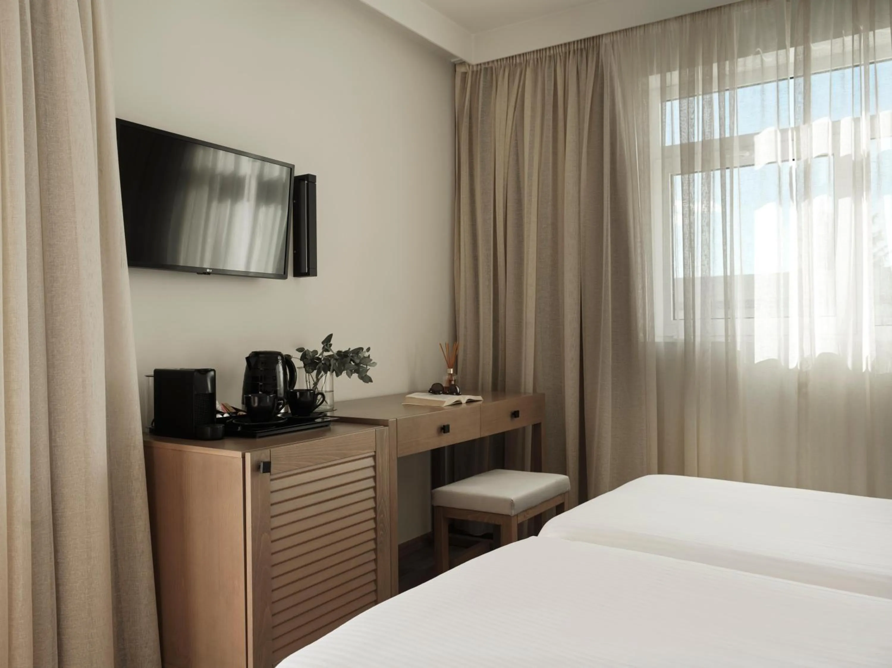 TV and multimedia, Bed in Civitel Attik Rooms & Suites