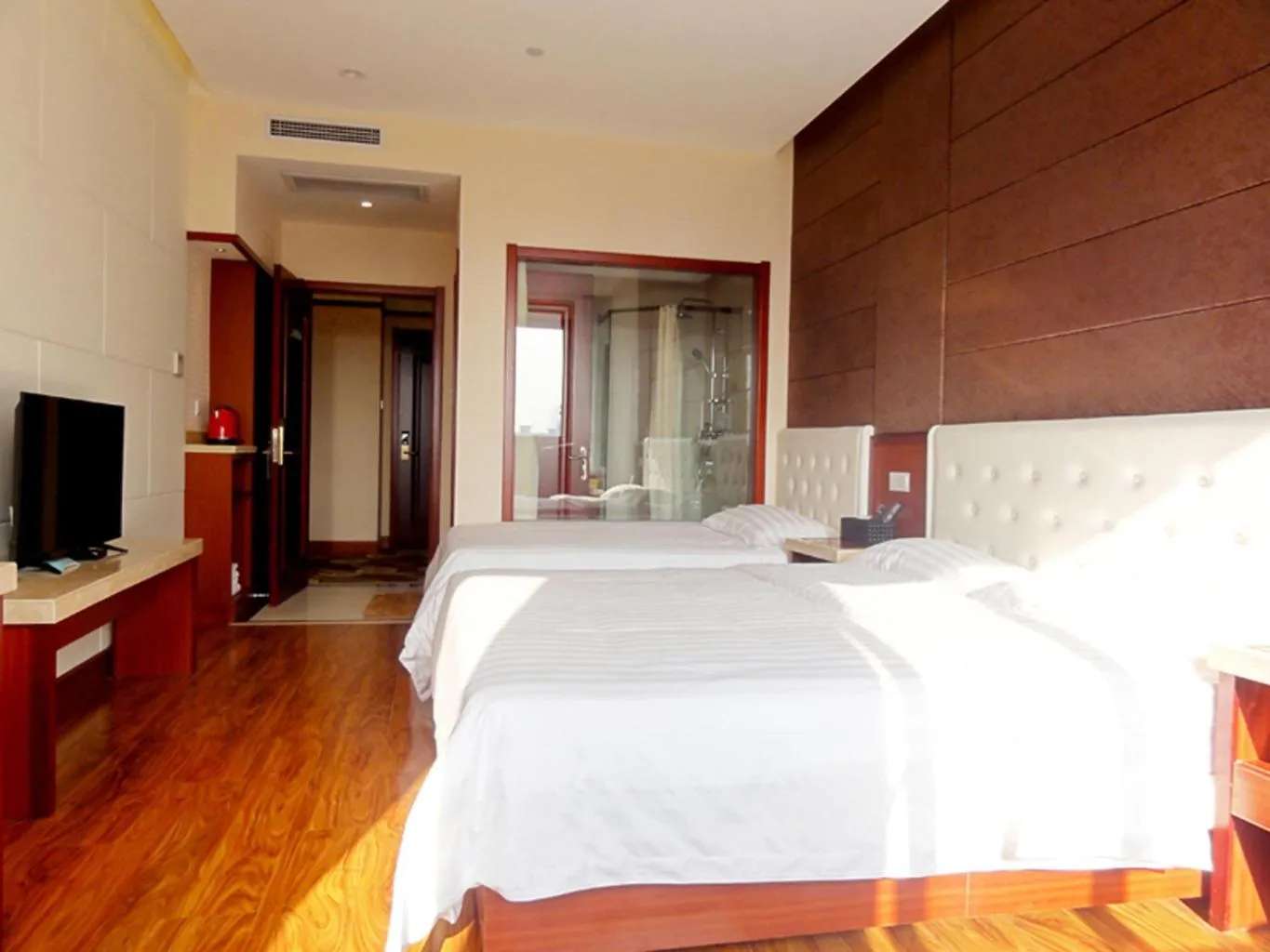 Bed in Hua Qi Kaiserdom Hotel Zhongshan Road St Michael's Cathedral and Zhanqiao Pier Qingdao