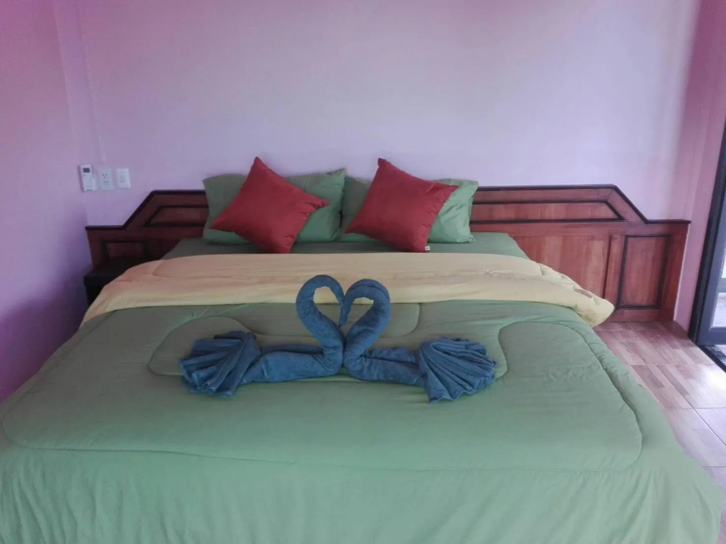 Bed in Chomlay Room & Restaurant