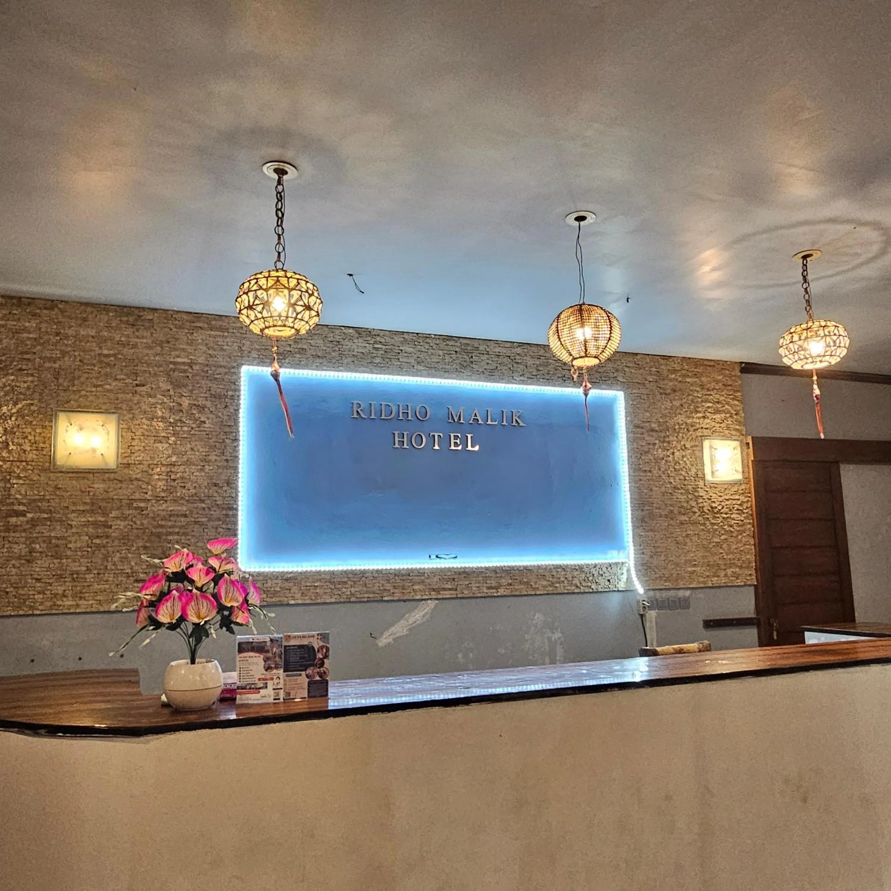 Lobby or reception in Ridho Malik Hotel
