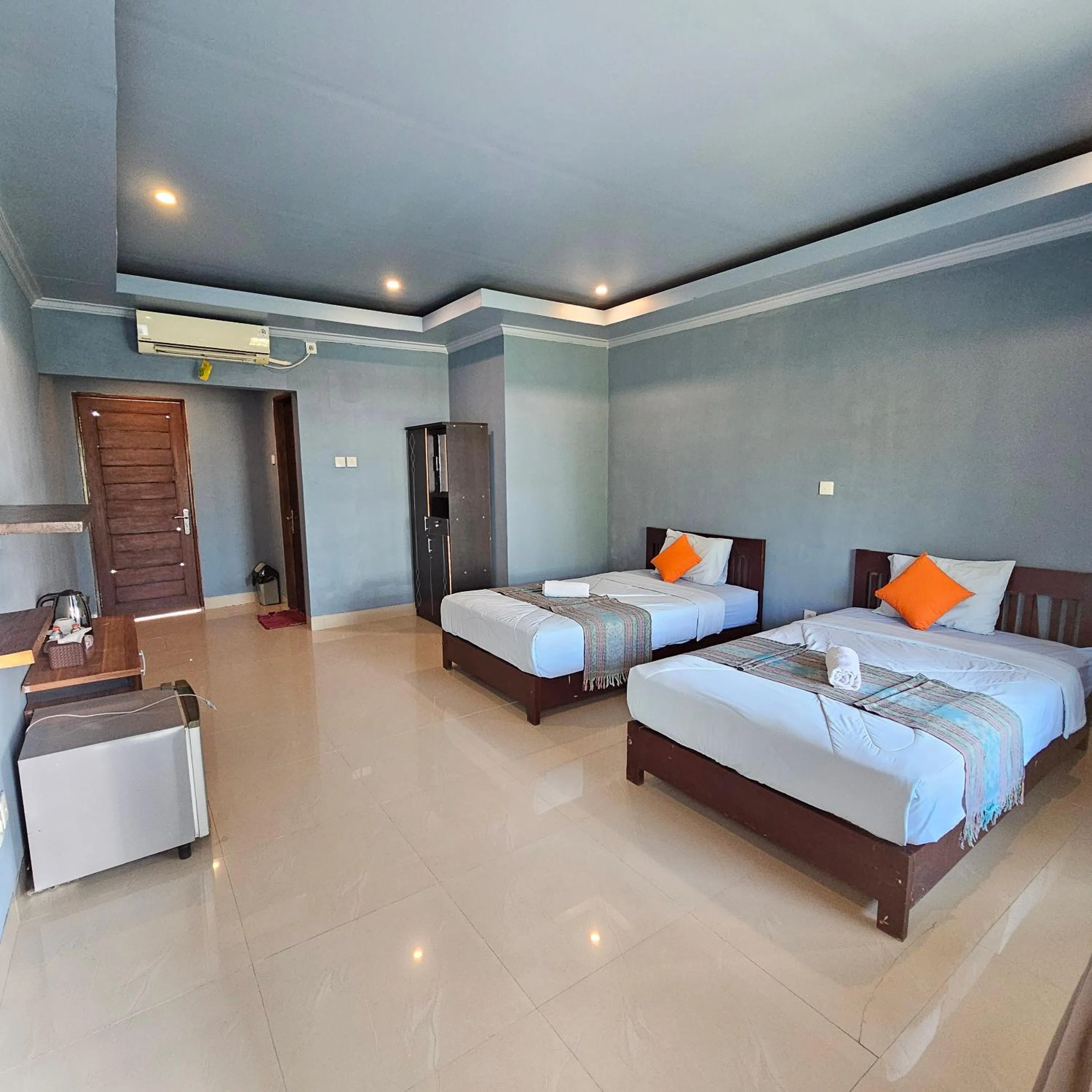 Bed in Ridho Malik Hotel