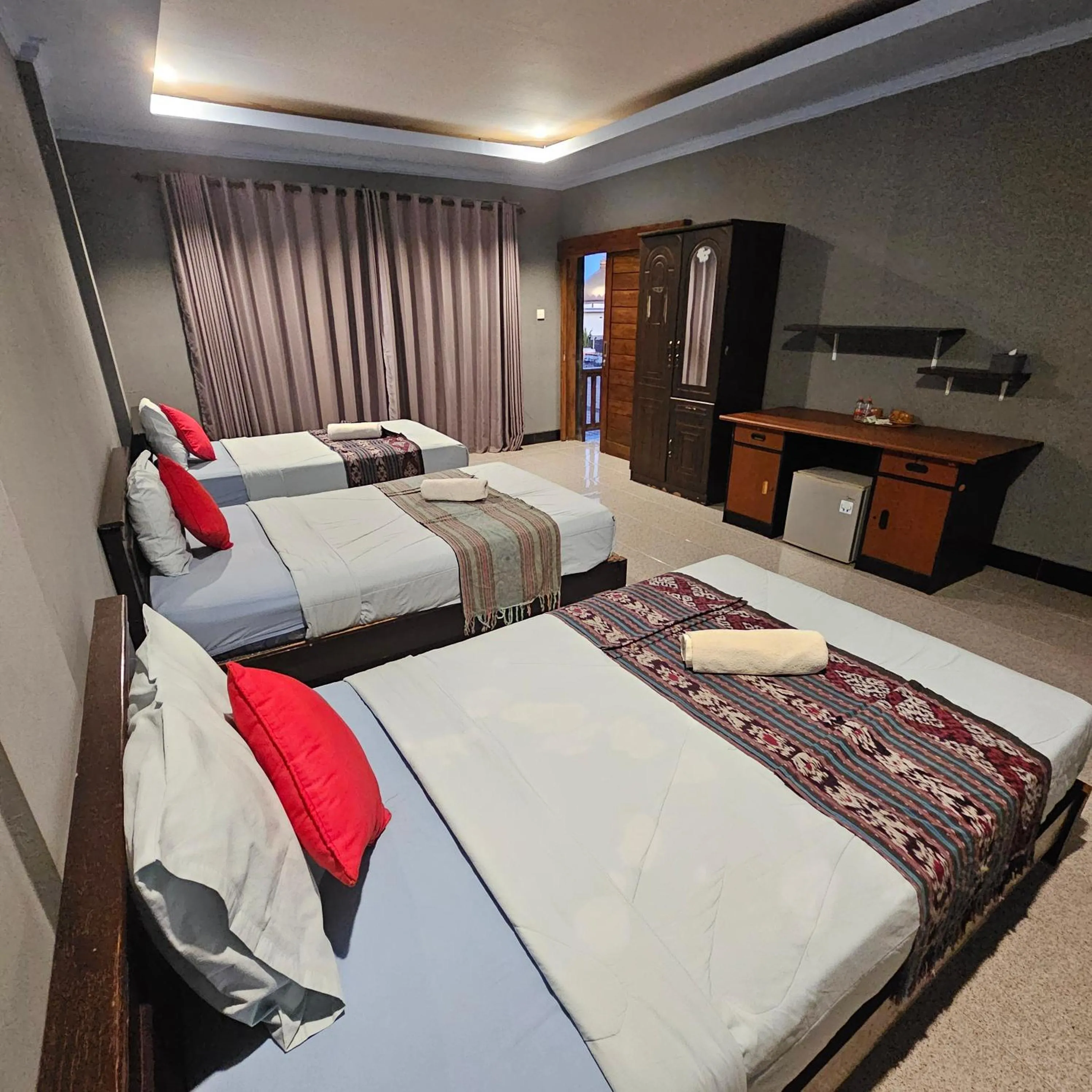 Bed in Ridho Malik Hotel