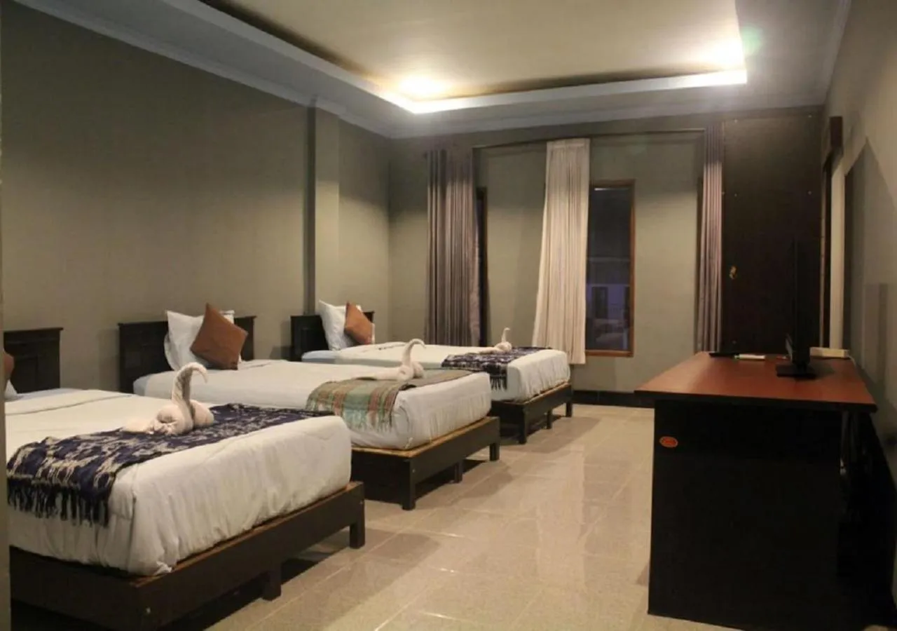 Bed in Ridho Malik Hotel