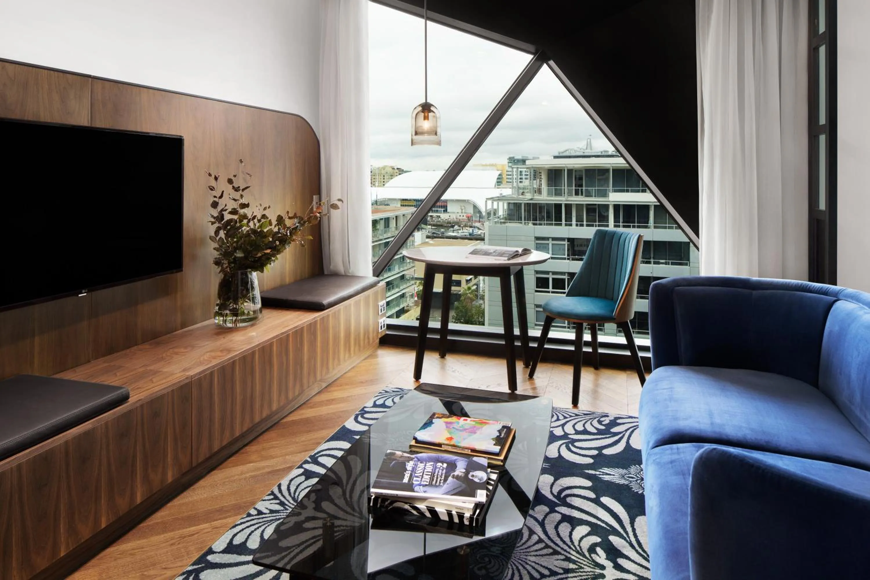 Living room in West Hotel Sydney, Curio Collection by Hilton
