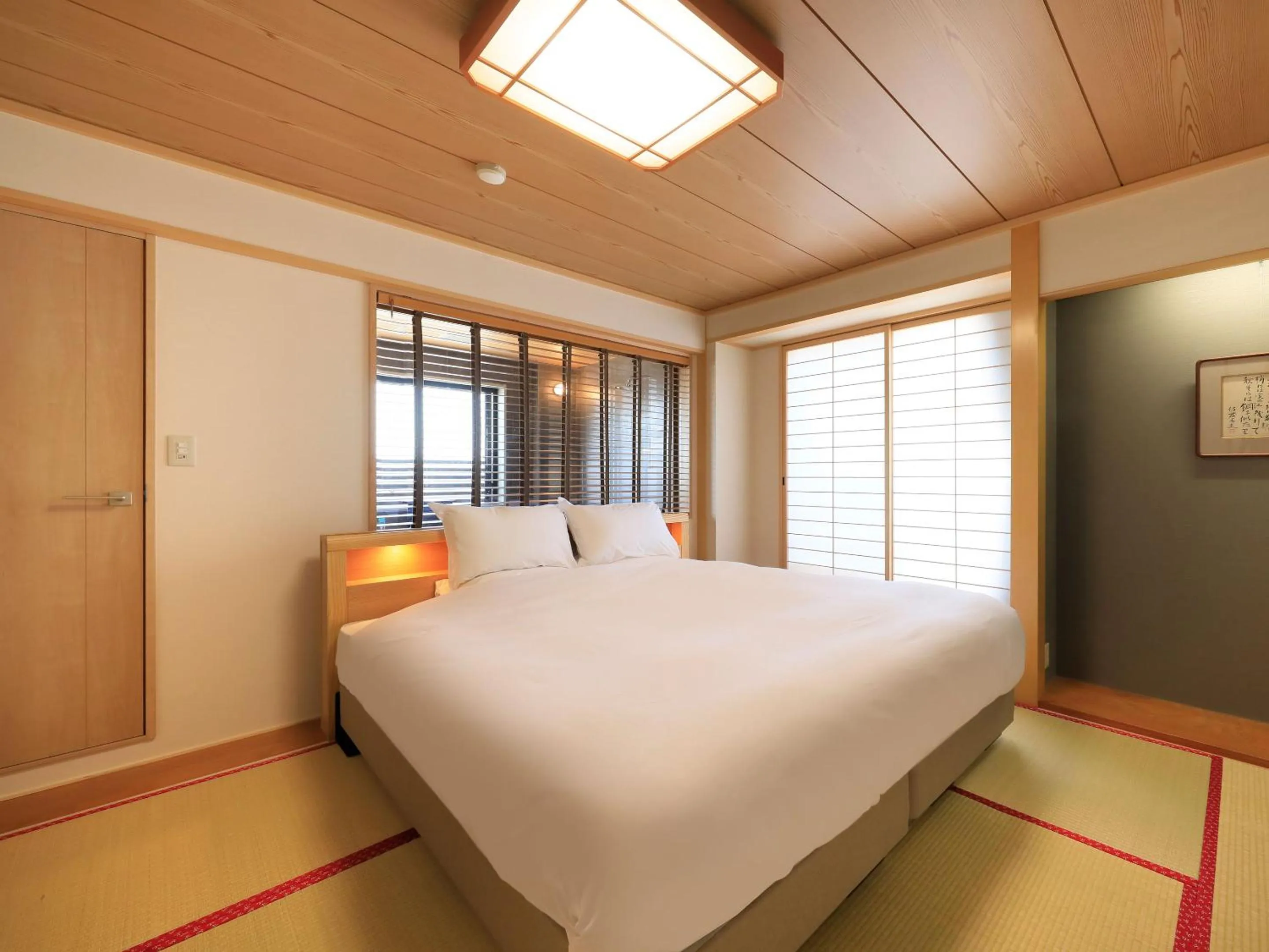 Bed in Hotel Tsubakino