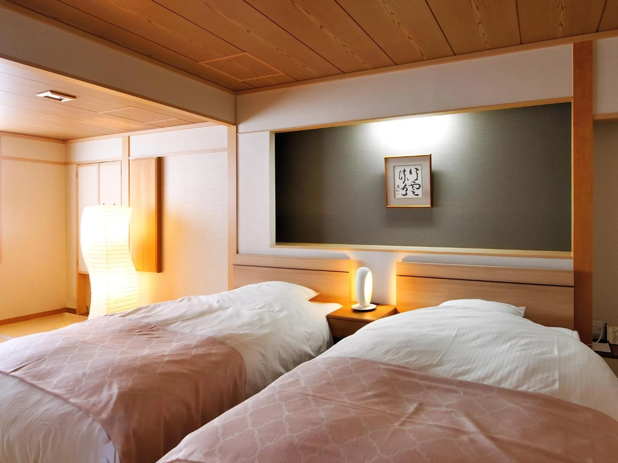 Bed in Hotel Tsubakino