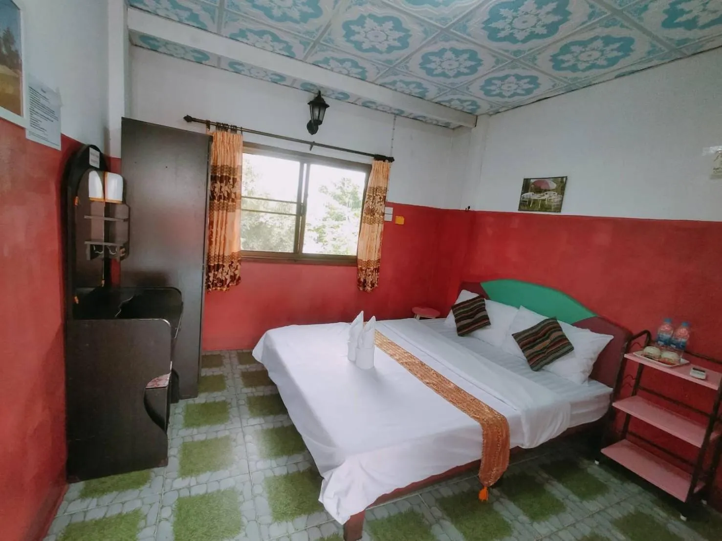 Bed in Sabaydee House at Pai