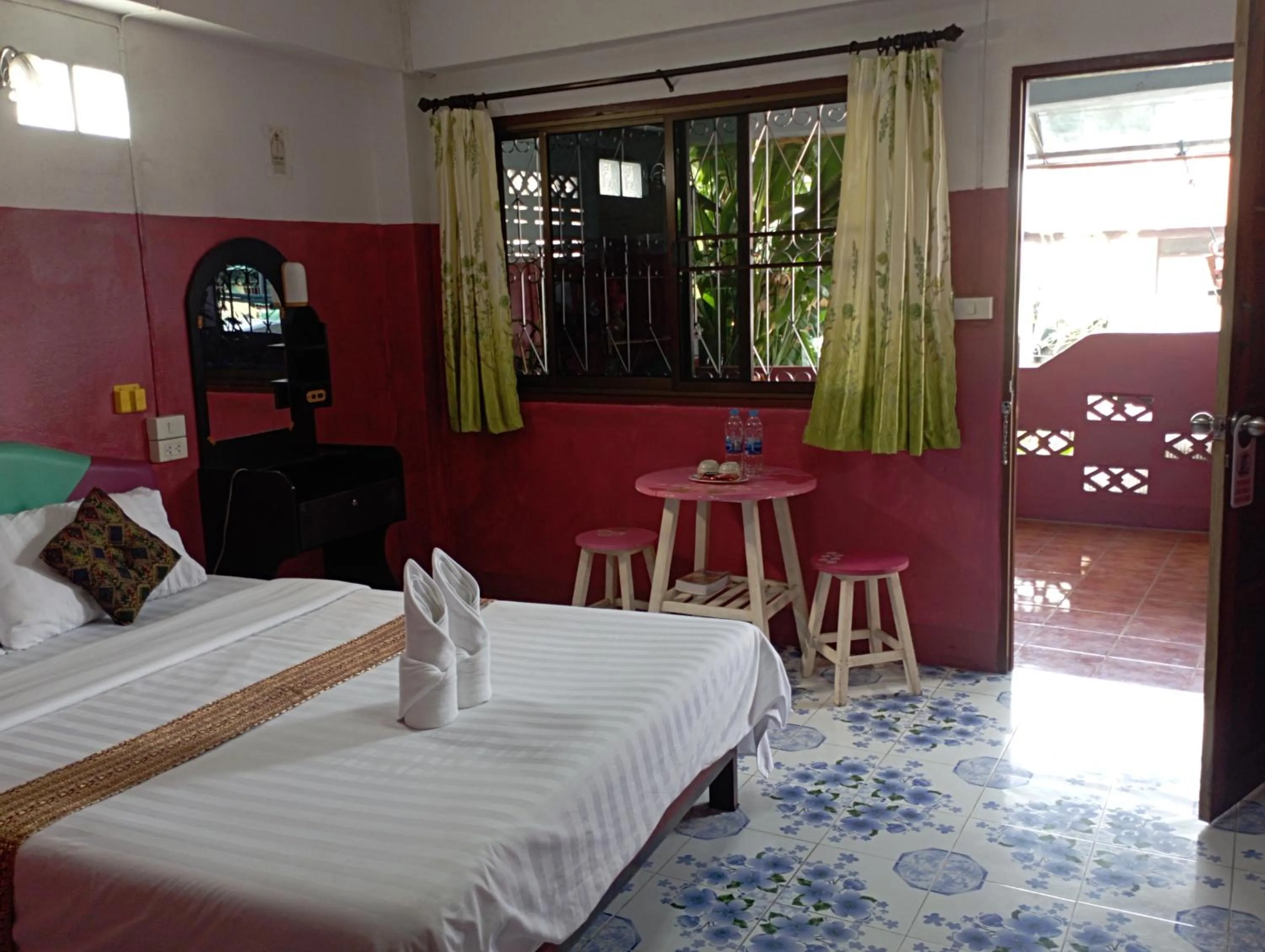 Bed in Sabaydee House at Pai