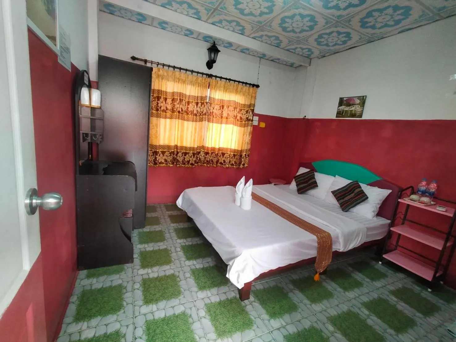 Bed in Sabaydee House at Pai