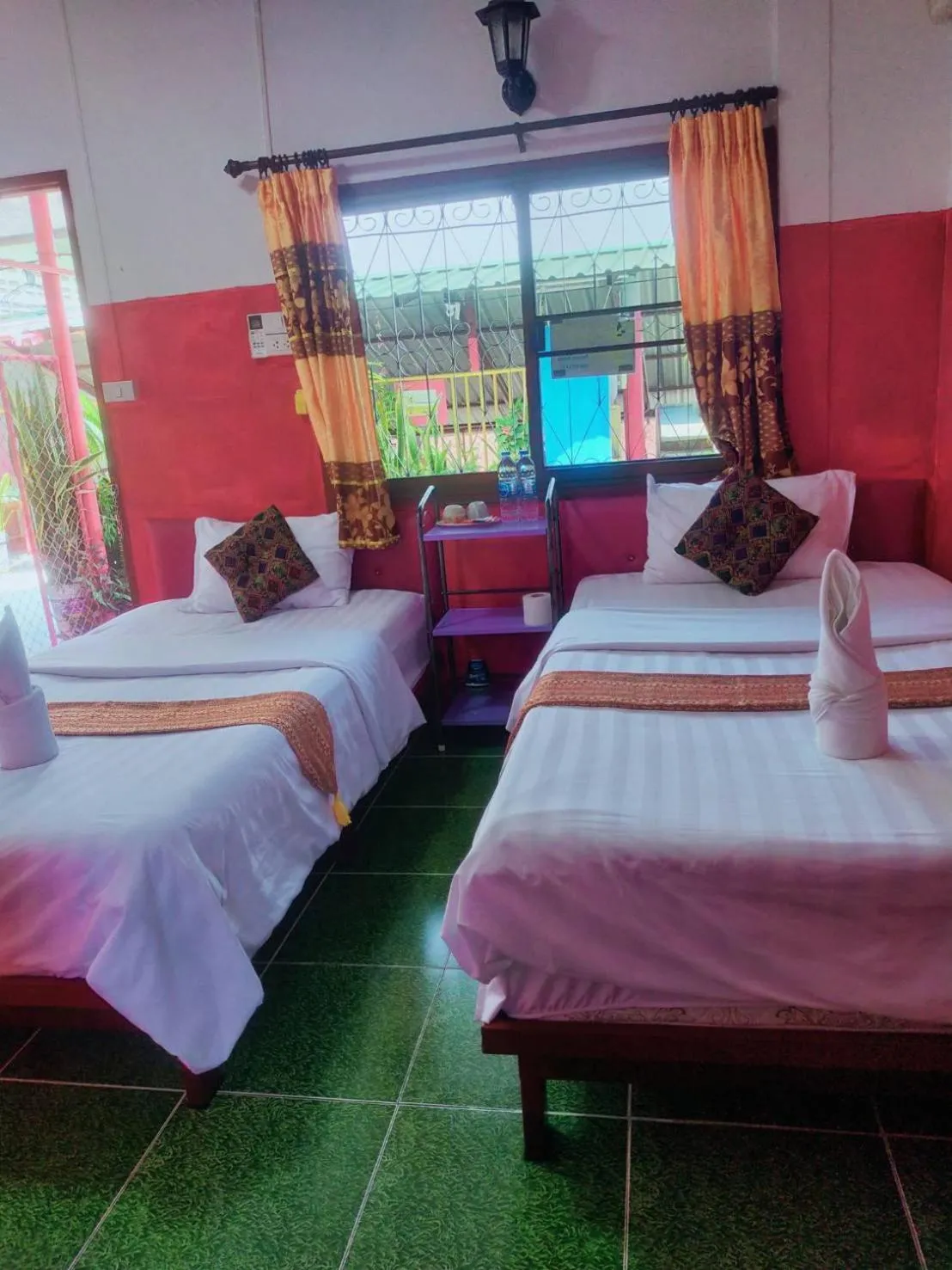 Bed in Sabaydee House at Pai