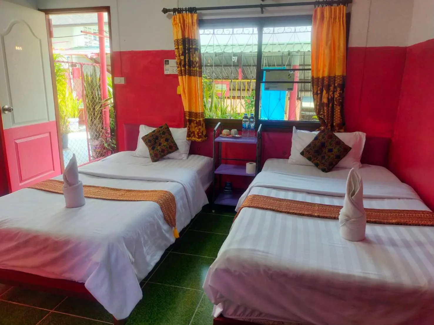 Bed in Sabaydee House at Pai